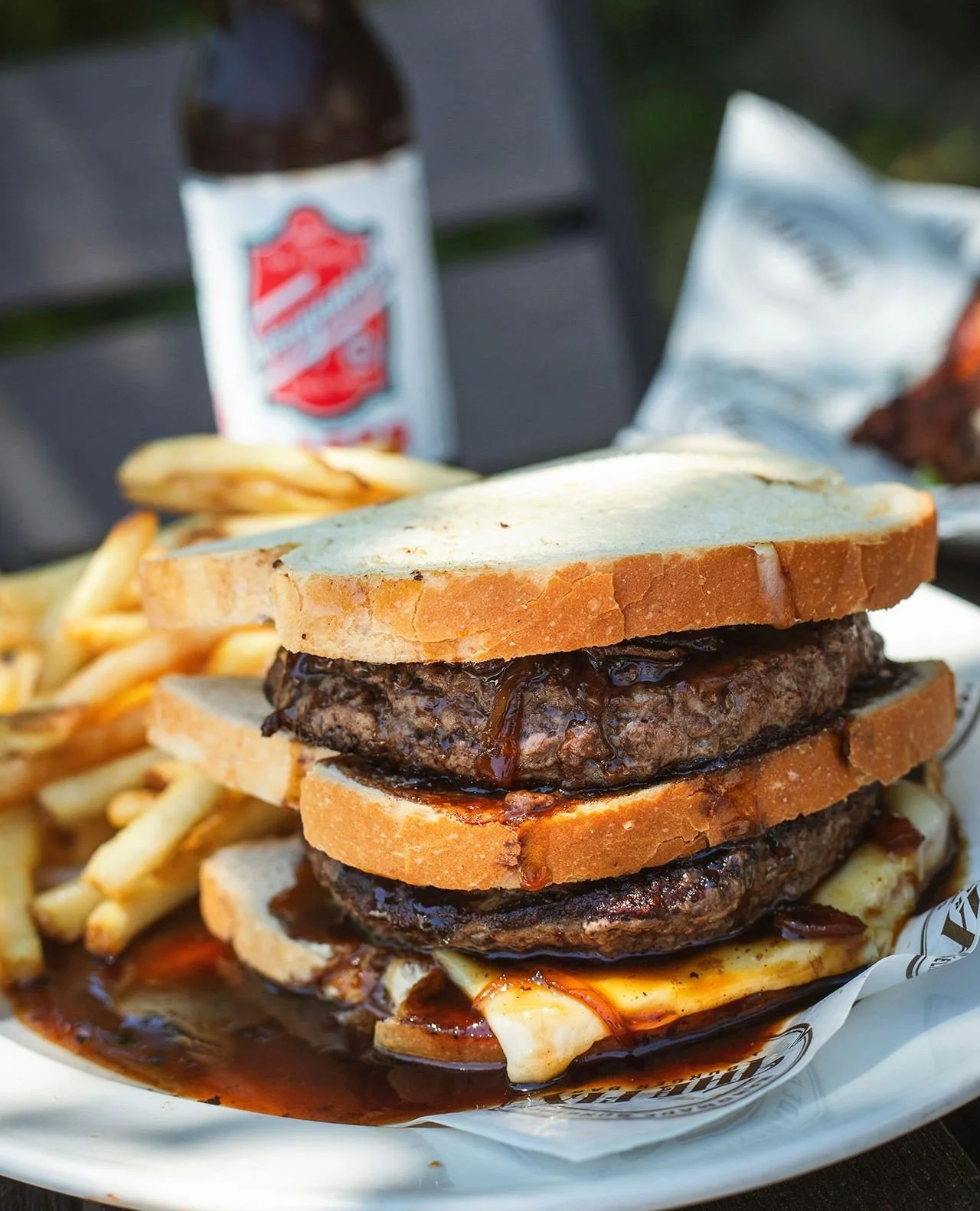 Where my patty people at! The Big Daddy Melt looking like an absolute unit. Now in Marlborough!⁠
⁠
Sourdough bread, two grass-fed burgers, melted american and cheddar cheese, grilled onions, bacon jam