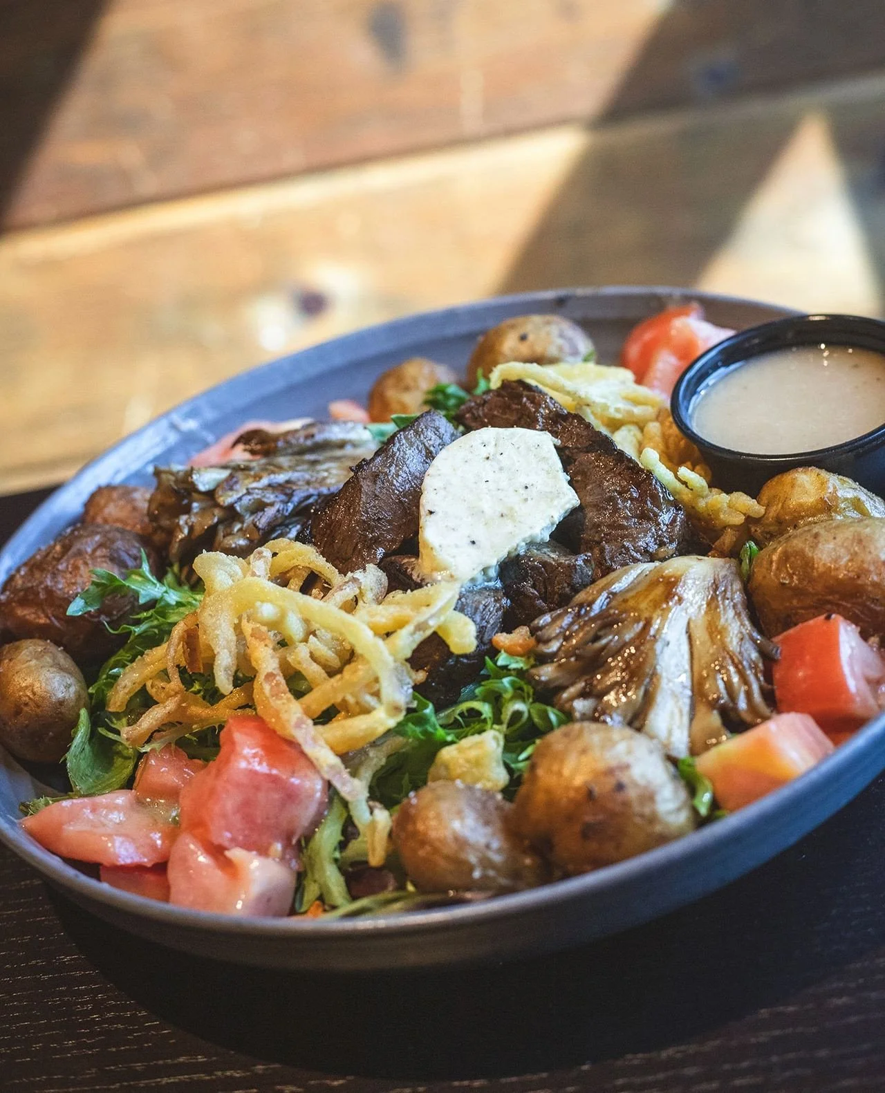 It's about 90 degrees... maybe today isn't the day to stand over a grill.⁠
⁠
Cool off inside and try our new Steak &amp; Potatoes Bowl&mdash;grilled steak tips, grilled maitake mushrooms, russet potatoes tossed in truffle butter, fried shallots, mari