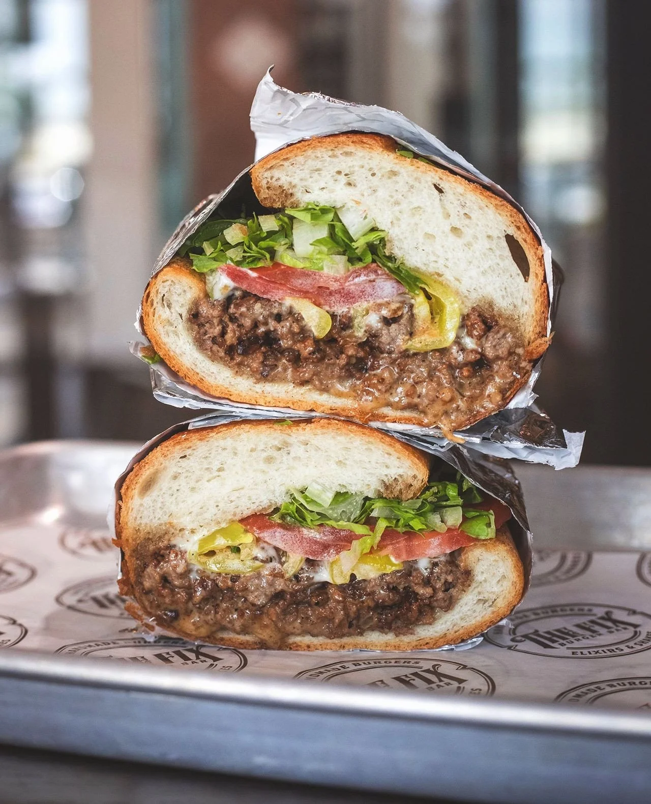 8oz of our house burger gets chopped on the grill with American cheese and diced onion, then piled into a hoagie roll with garlic aioli, shaved lettuce, tomato &amp; banana peppers.⁠
⁠
Our new Chopped Cheese is messy in all the right ways. Served wit