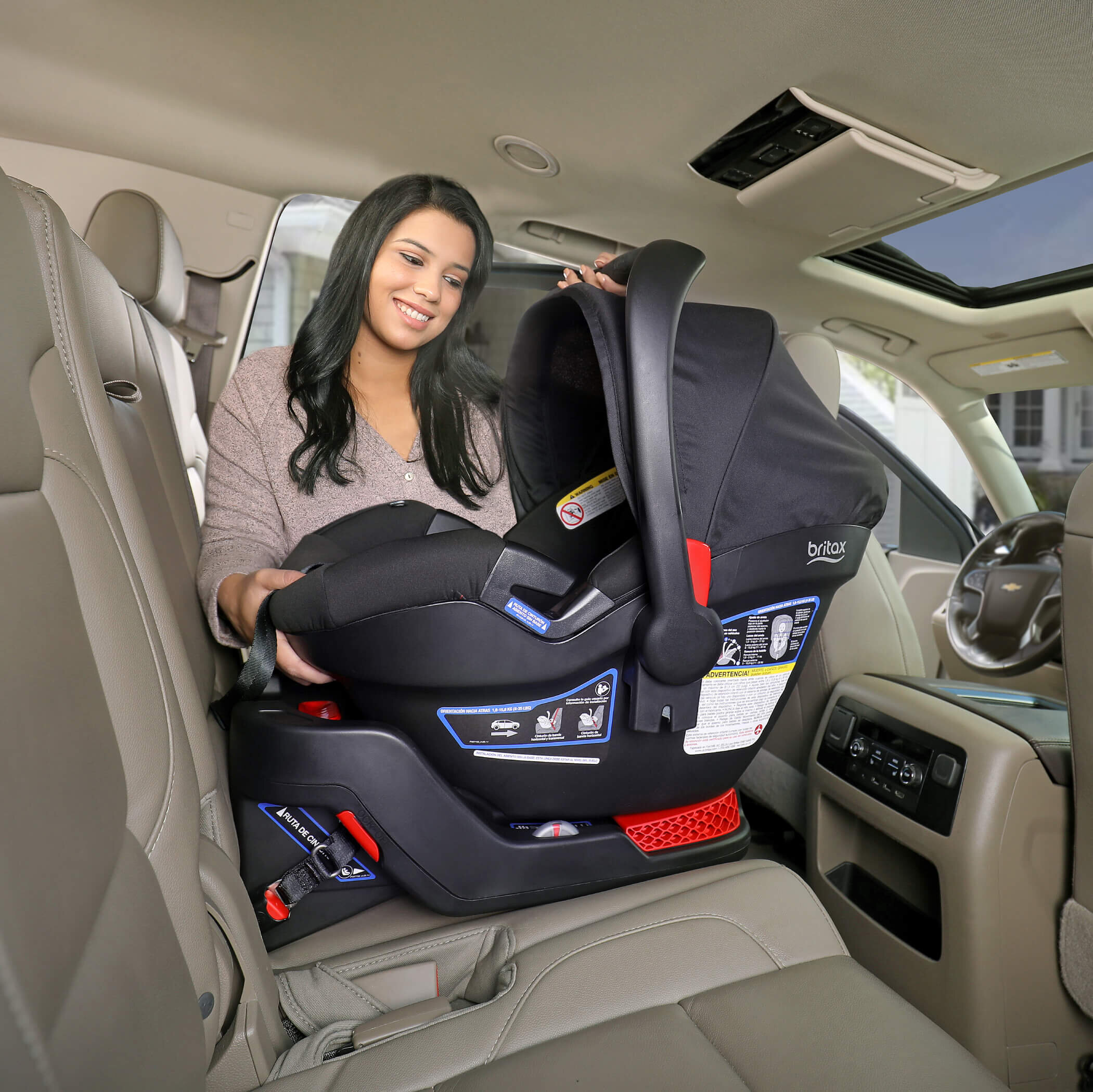 Lifestyle Image with Infant Car Seat and Base