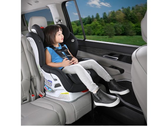 Child seated in a black contour boulevard clicktight convertible car seat