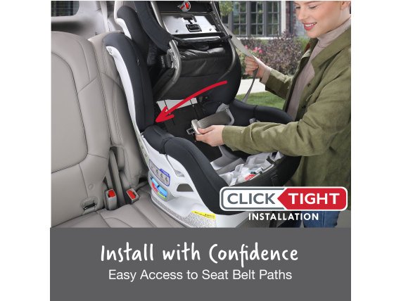 Woman installing boulevard clicktight convertible car seat with clicktight  (Copy)
