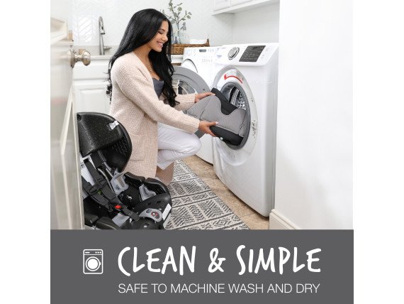Woman placing gray contour car seat cover into washer (Copy)