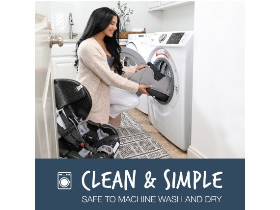Woman placing blue contour car seat cover into washer (Copy)