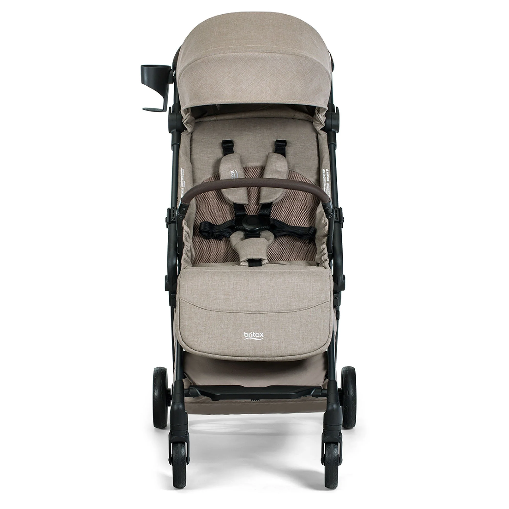 A tan stroller with a brown bumper bar, a canopy, a cup holder, and the Britax logo on the leg rest. 