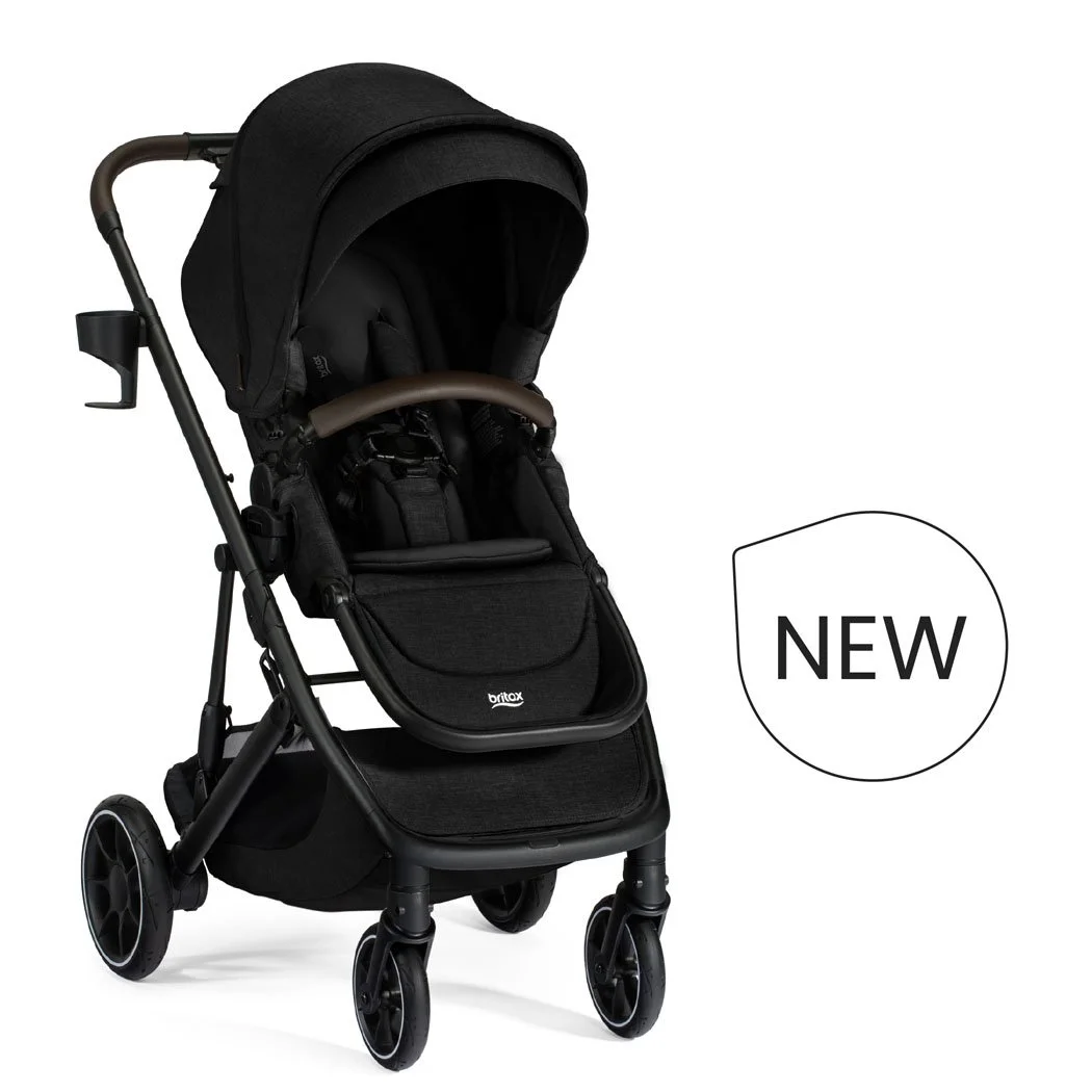 New. A black stroller with a canopy, a brown bumper bar, a cup holder, and the Britax logo on the leg rest. 