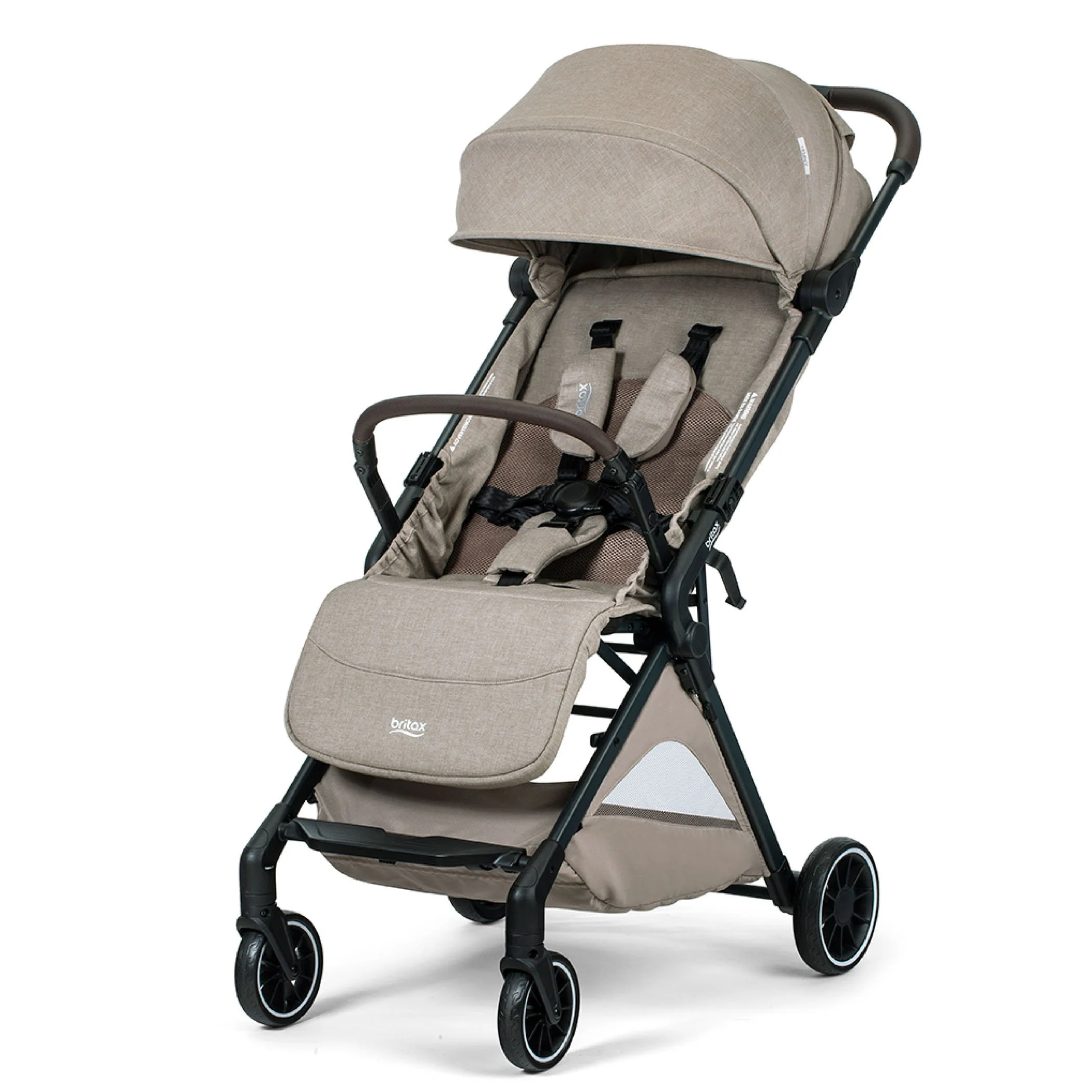 A tan stroller with a brown bumper bar, a canopy, a cup holder, and the Britax logo on the leg rest. 