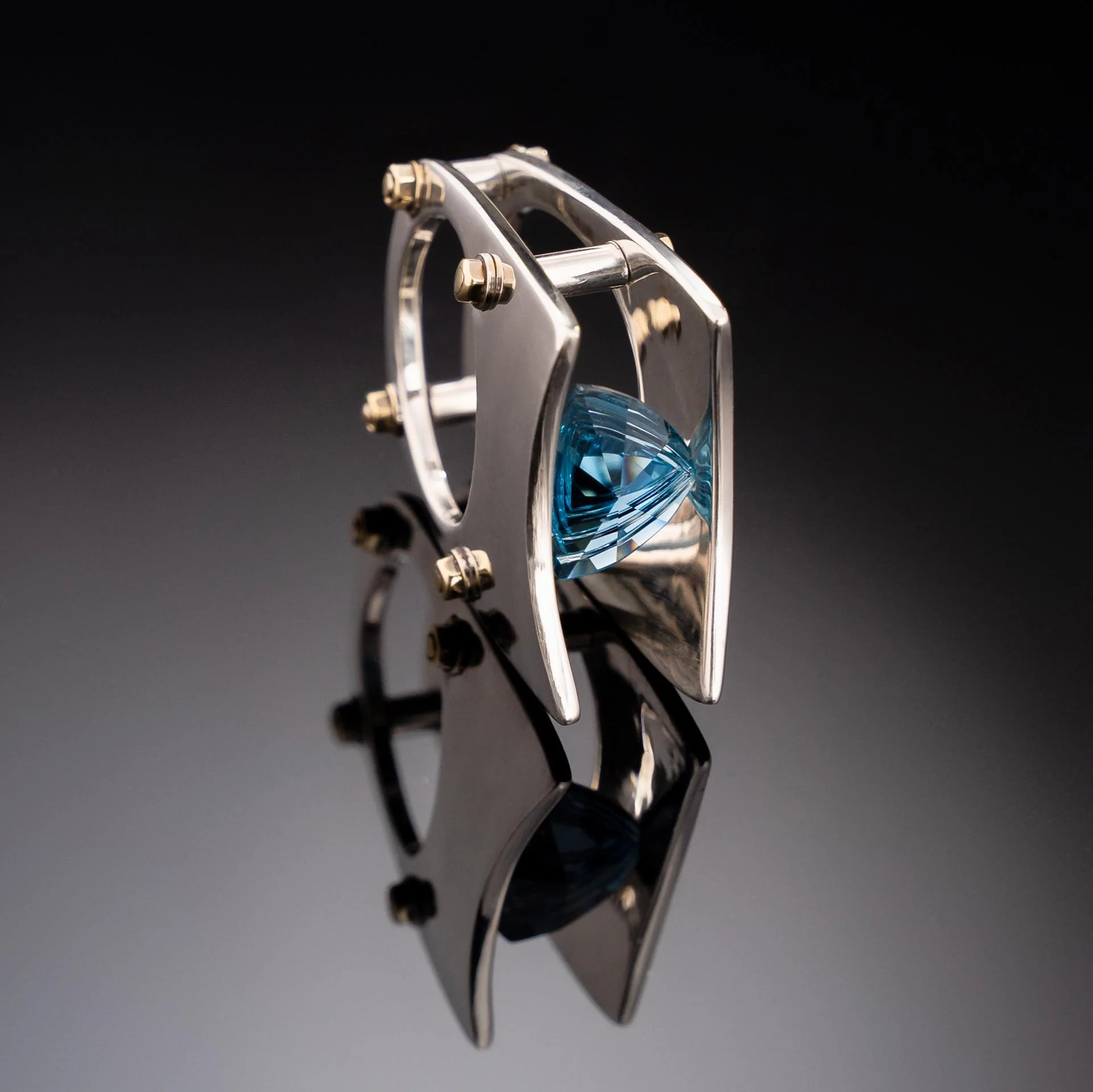 4. Captured Fantasy Cut Swiss Blue Topaz.jpg
