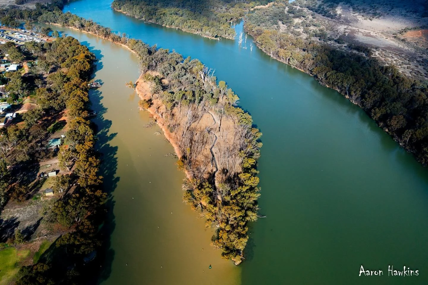 Where the rivers meet 🤝

Two rivers meet as old friends do
Sharing stories new and old both fabled and true 
From flood to drought to raging fires 
Through the years they have supported life and lives
A meeting place so iconic it&rsquo;s stood the t