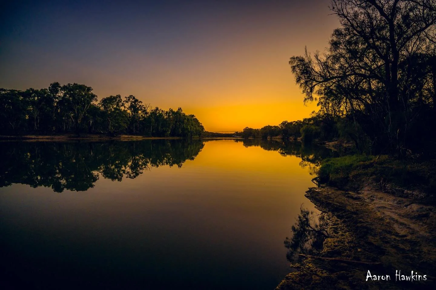 The end of a summers day on the river! 🌞🌅

Perfectly still, 40 degrees and not a soul to be seen. Well except for the pelican I startled who grunted at me haha.
How&rsquo;s the contrast between directions?! Glowing silhouette one direction and glow
