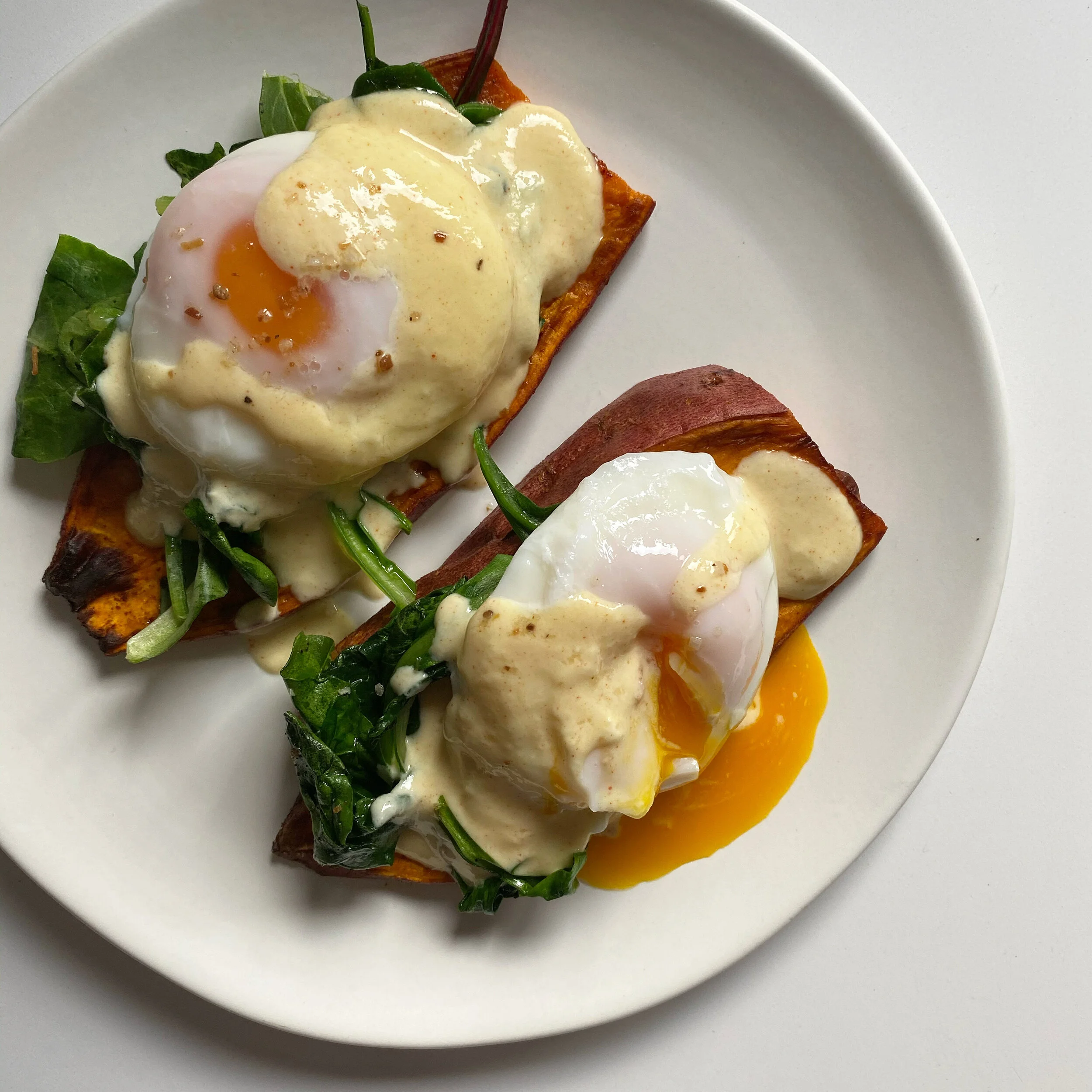 poached eggs with a greek yogurt hollandaise 