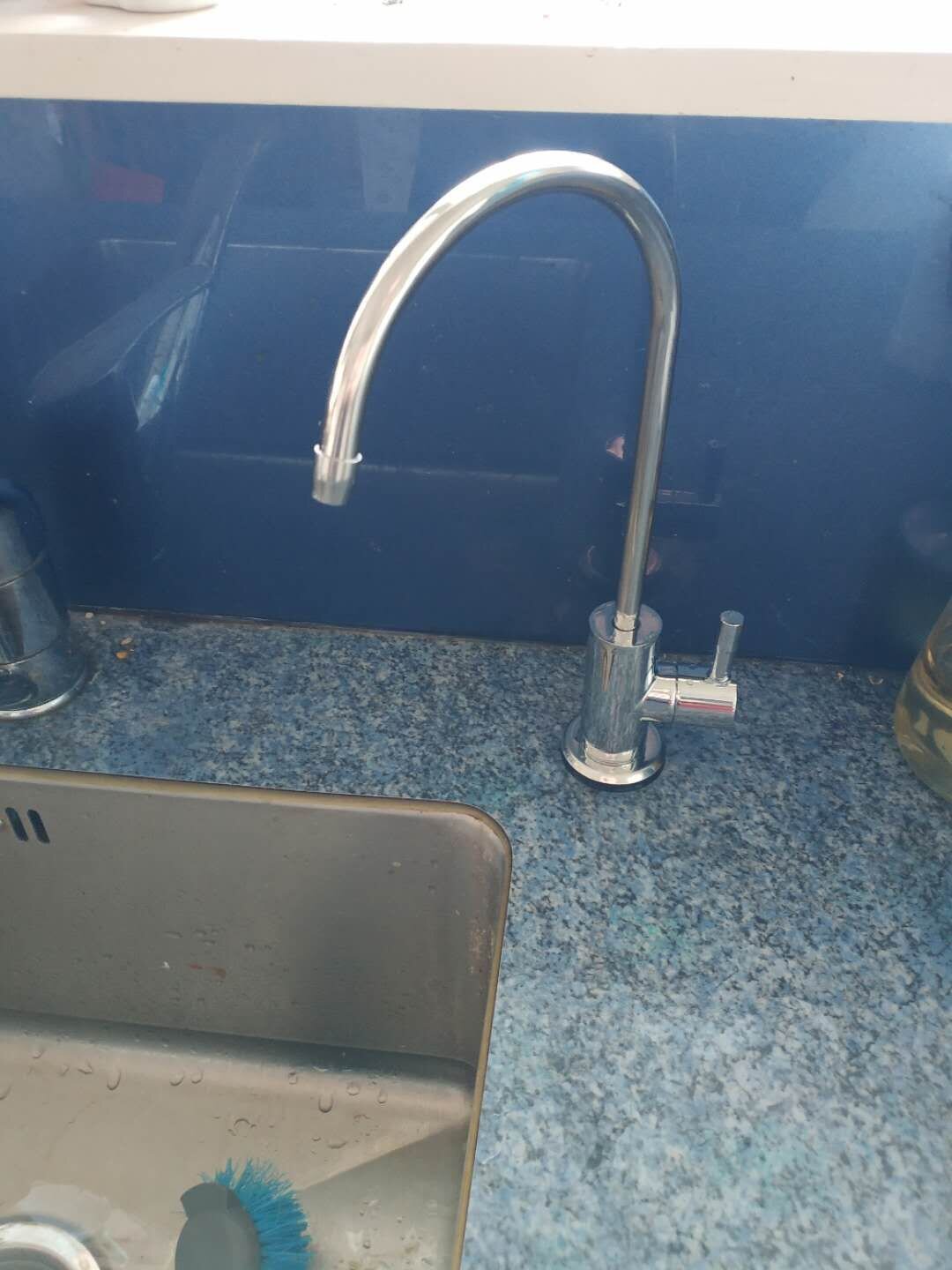 Polished Stainless Steel faucet fitted to standard bench top