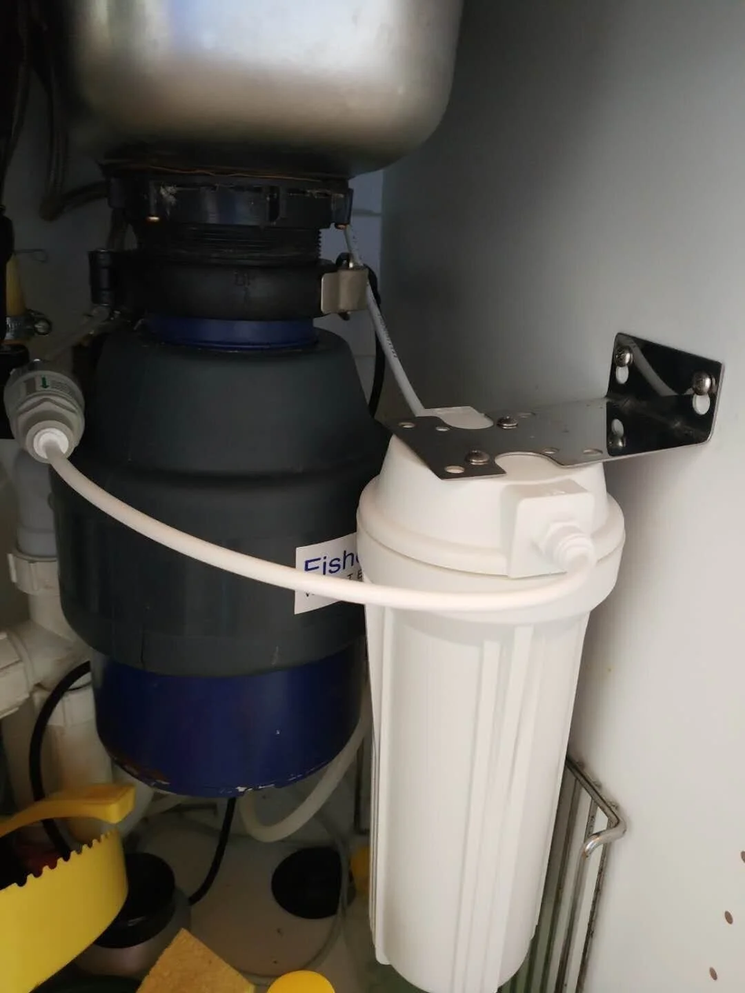 Typical Carbon Block filter unit under-bench with pressure valve