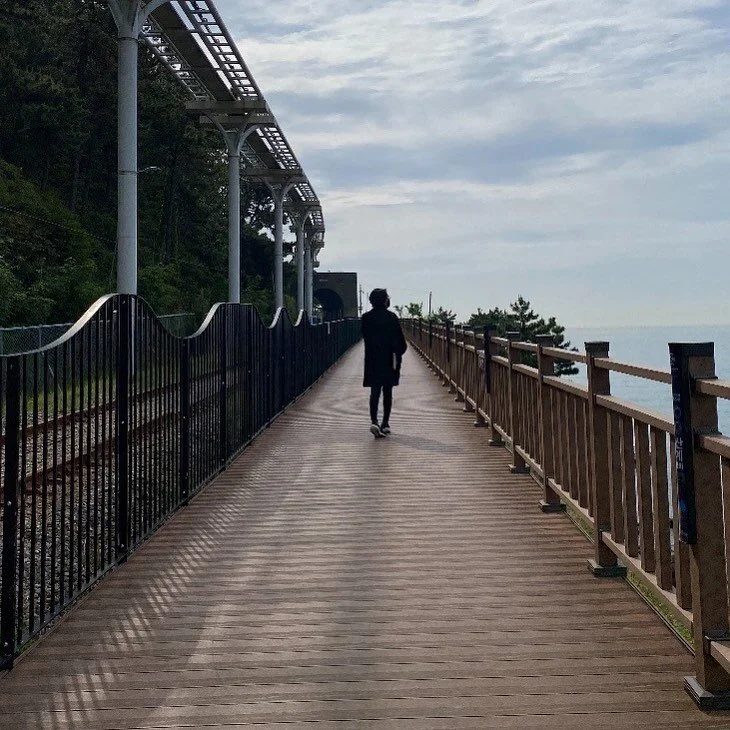 Taking the boardwalk instead of riding the blue line train in Haeundae, Busan.