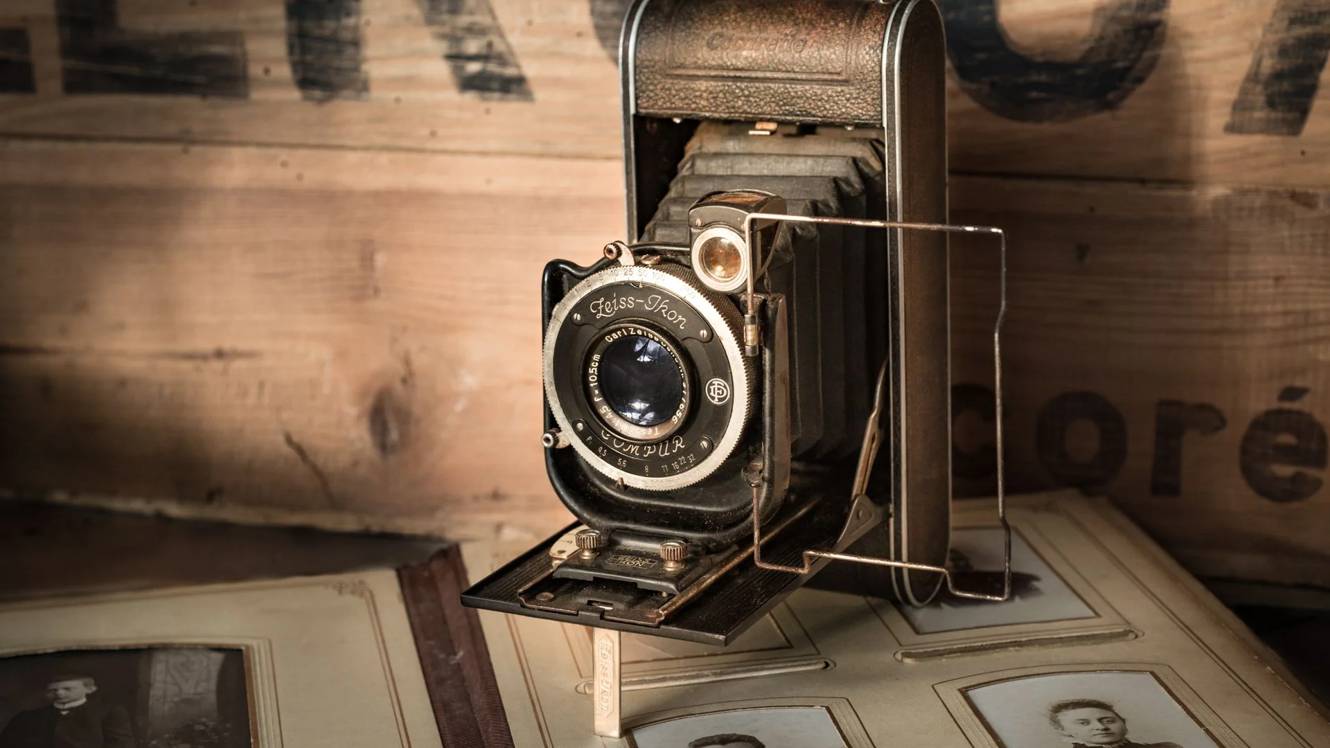 Vintage-Camera-on-Brown-Surface.jpg