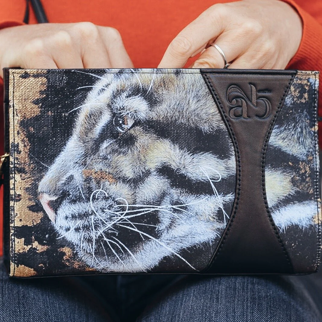 Clutch bag Zoé in black leather and feline, artwork Marchal