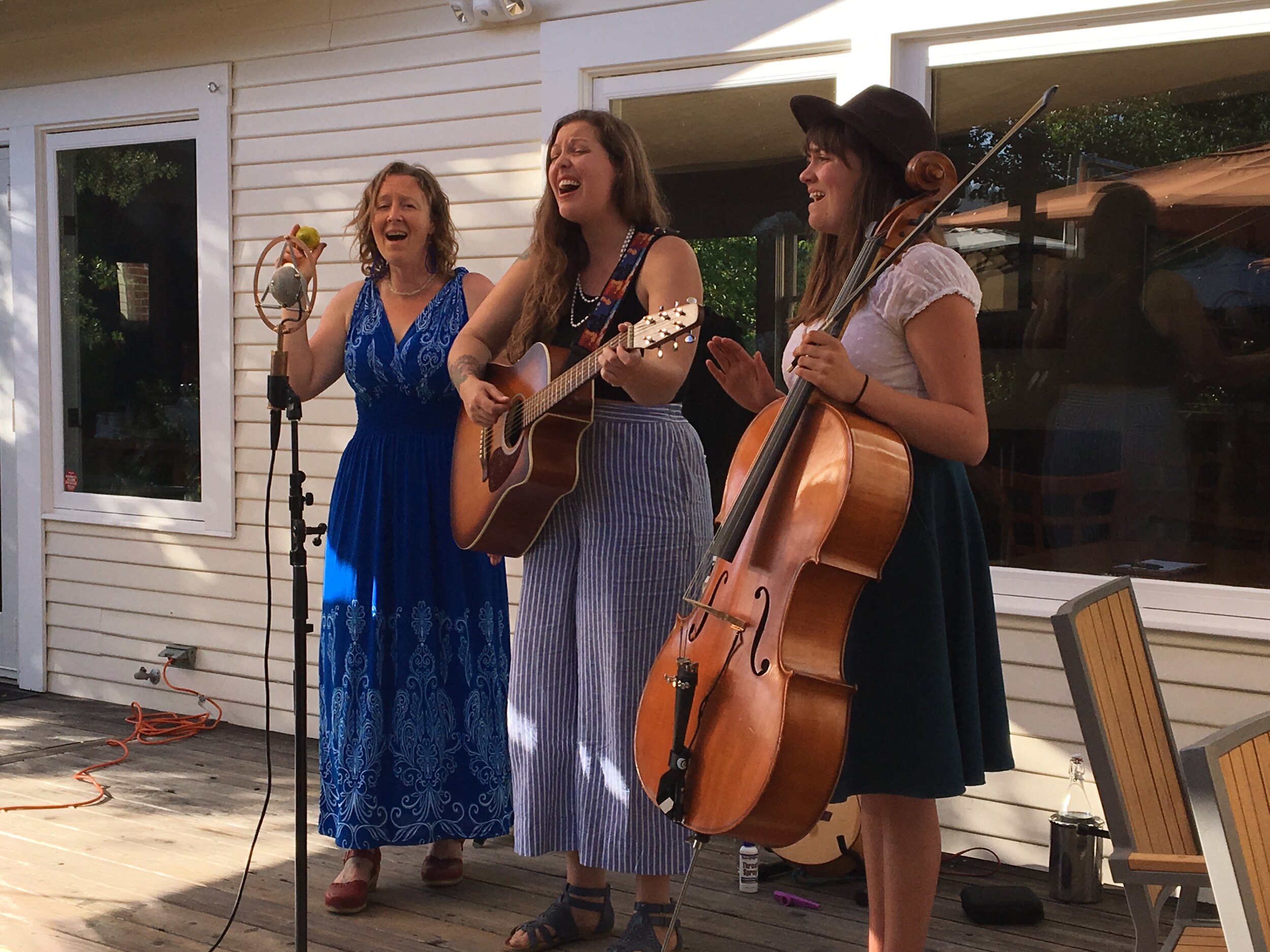 Three musicians perform at the Goldeneye Winemaker Dinner