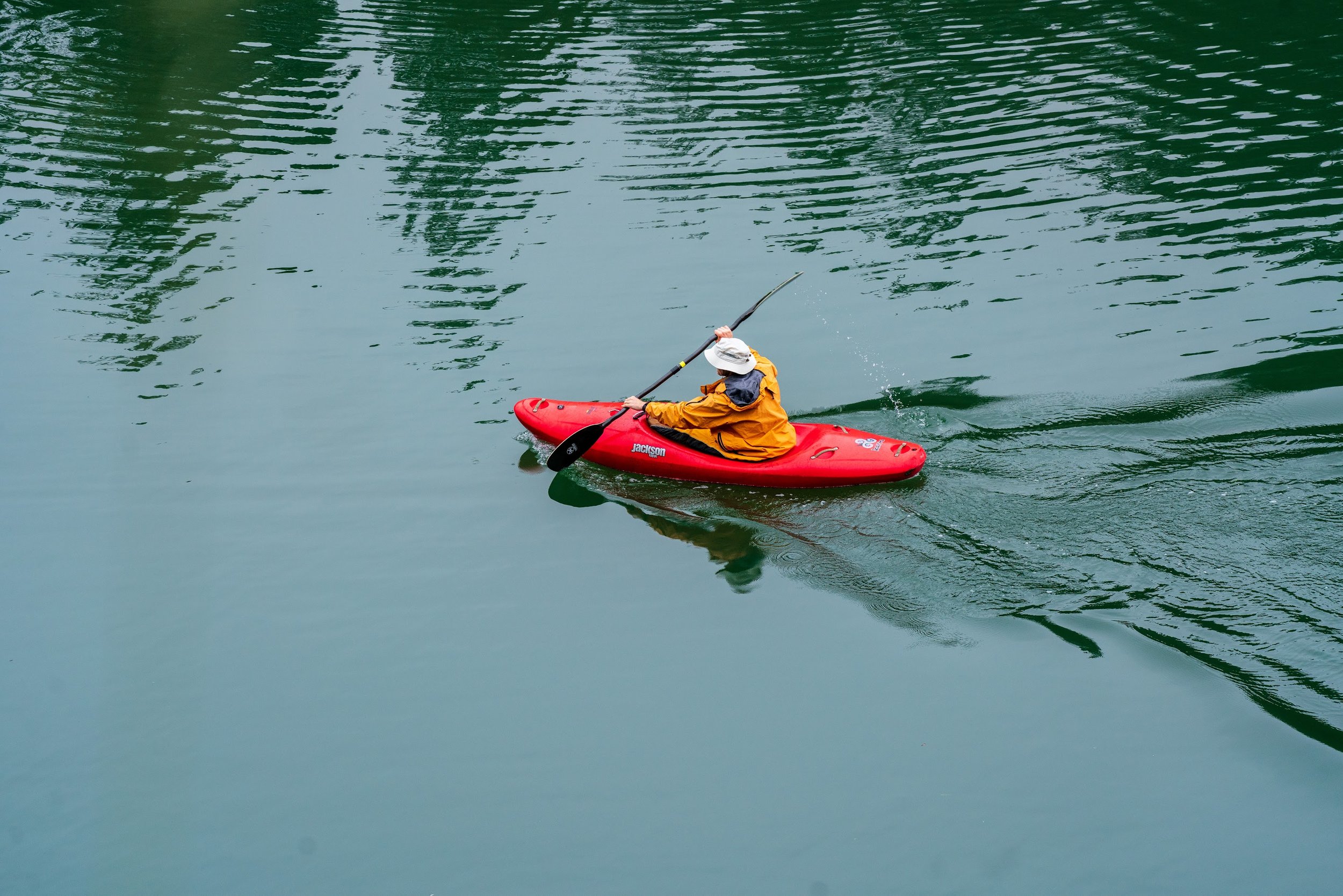 man in boat on water