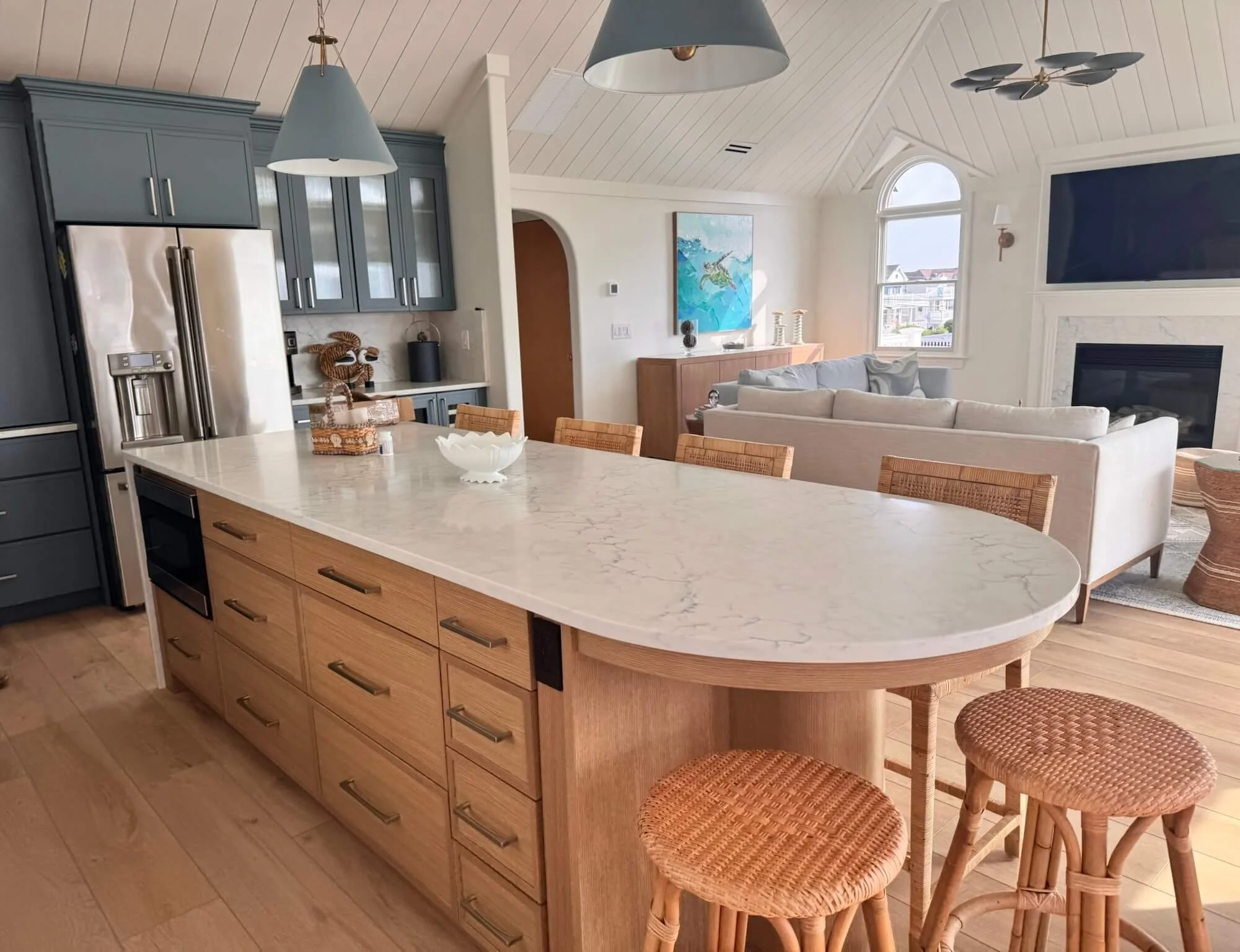 Open - concept kitchen layout by 2B Contracting.