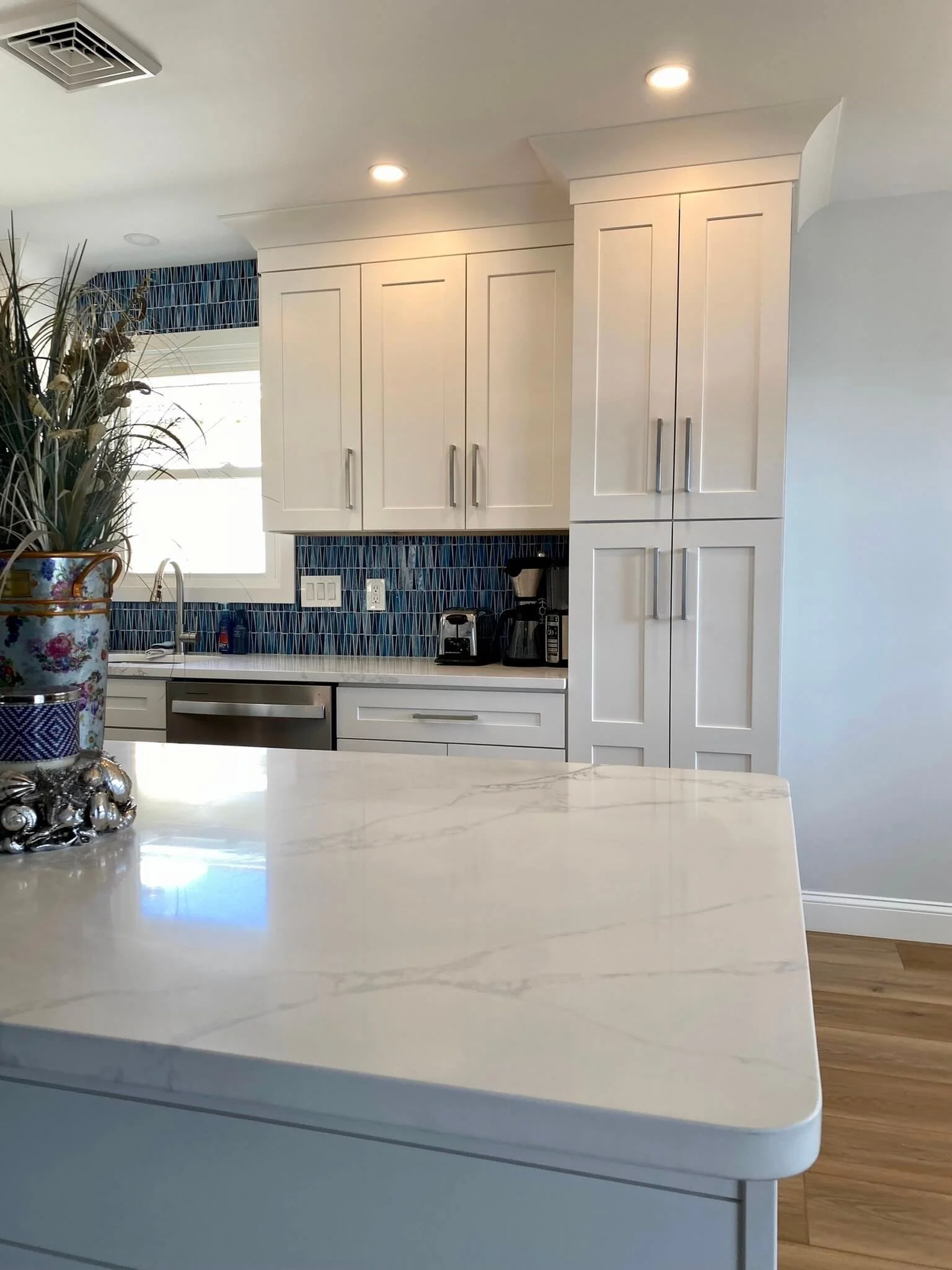 Quartz countertops installed in a 2B Contracting remodel.