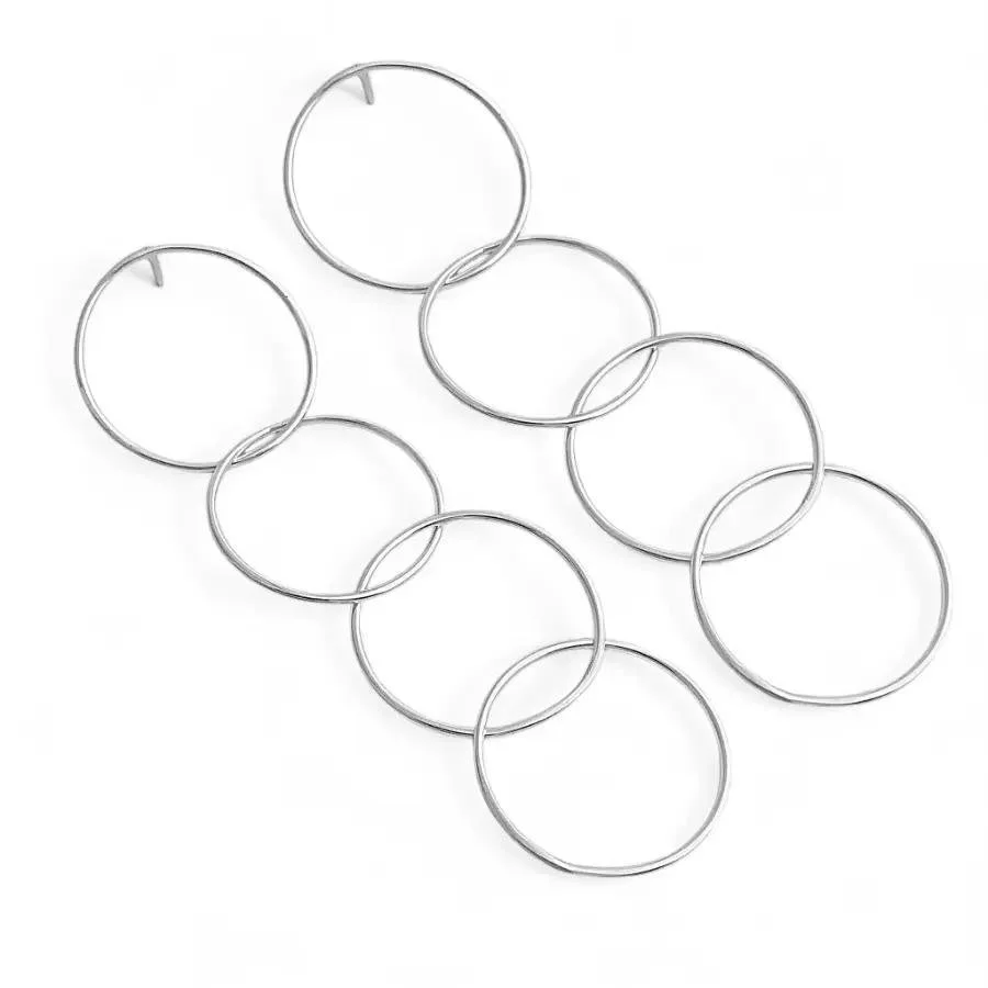 White earrings with four hoops hanging one from the other.