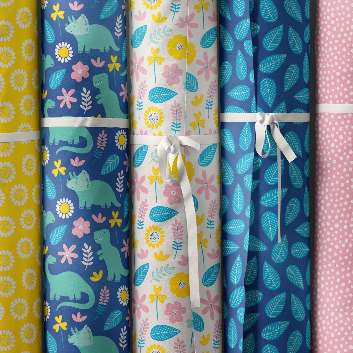 Dinos-daisies-fabric-roll-mockup.jpg