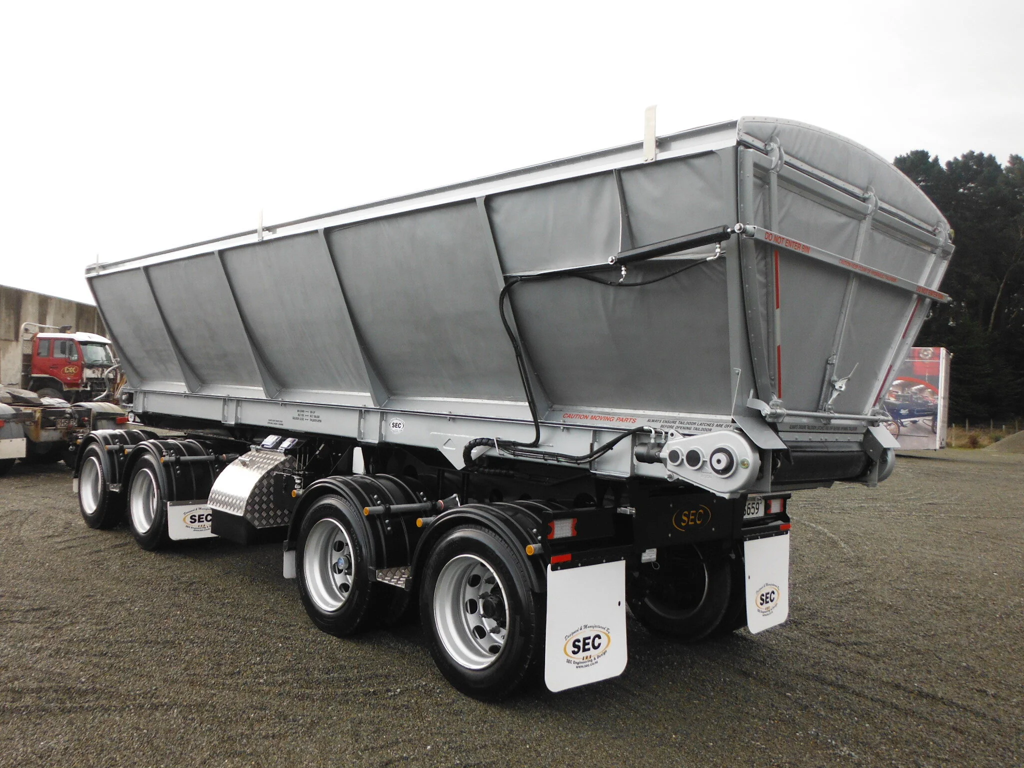 SPEC ASPHALT AUTO-UNLOADERS — SEC
