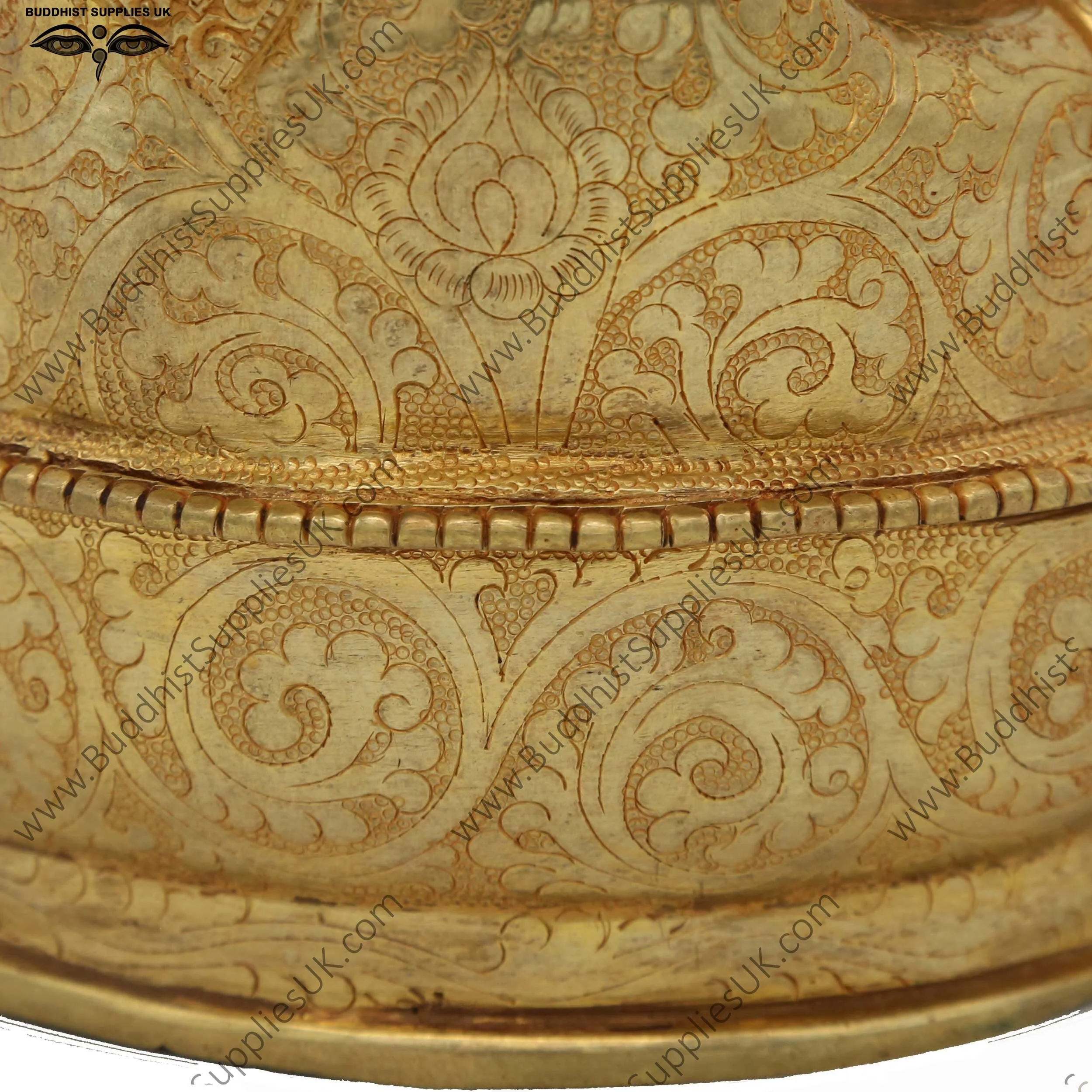 Gold plated Shakyamuni Buddha statue carving detail
