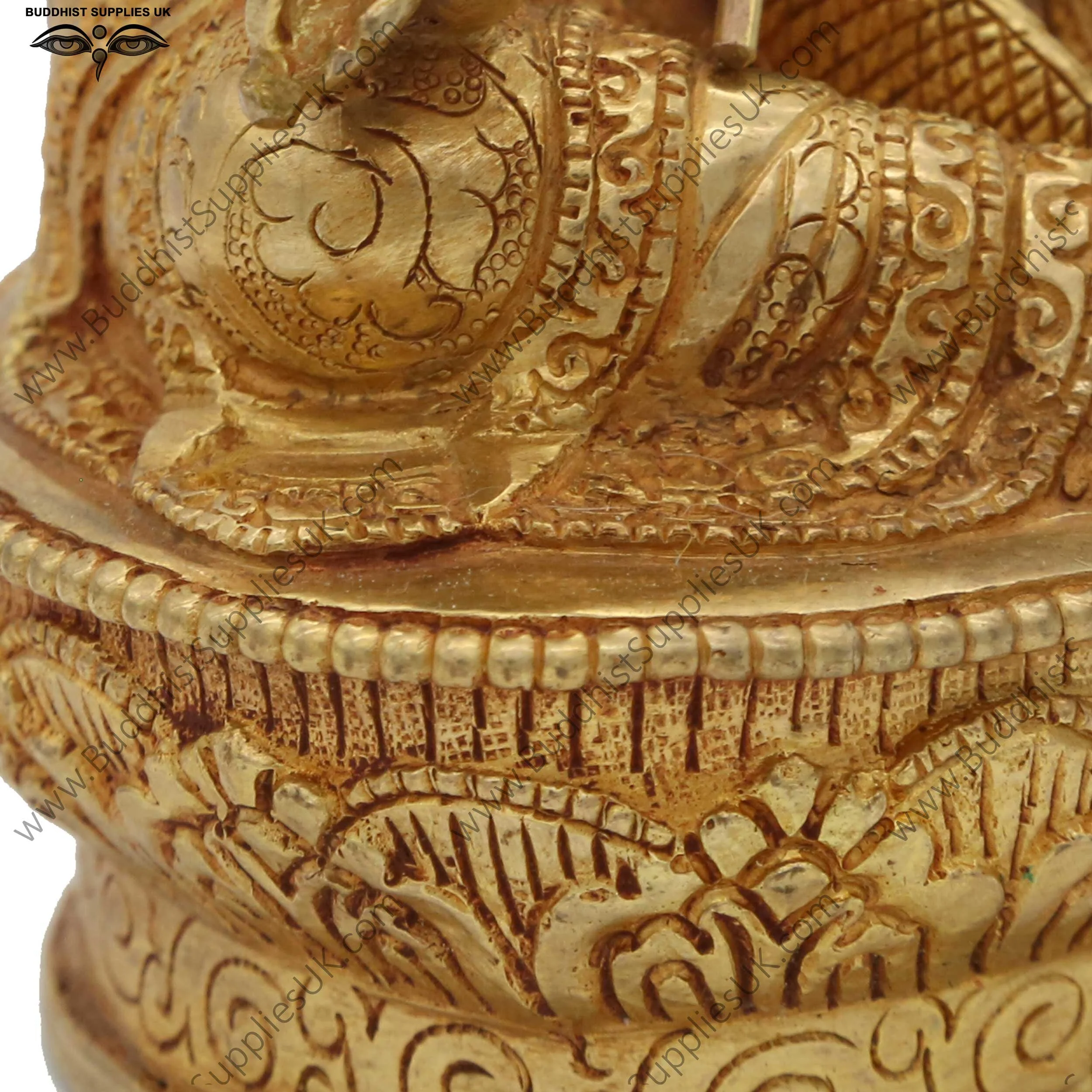 Gold plated Guru Rinpoche statue carving detail