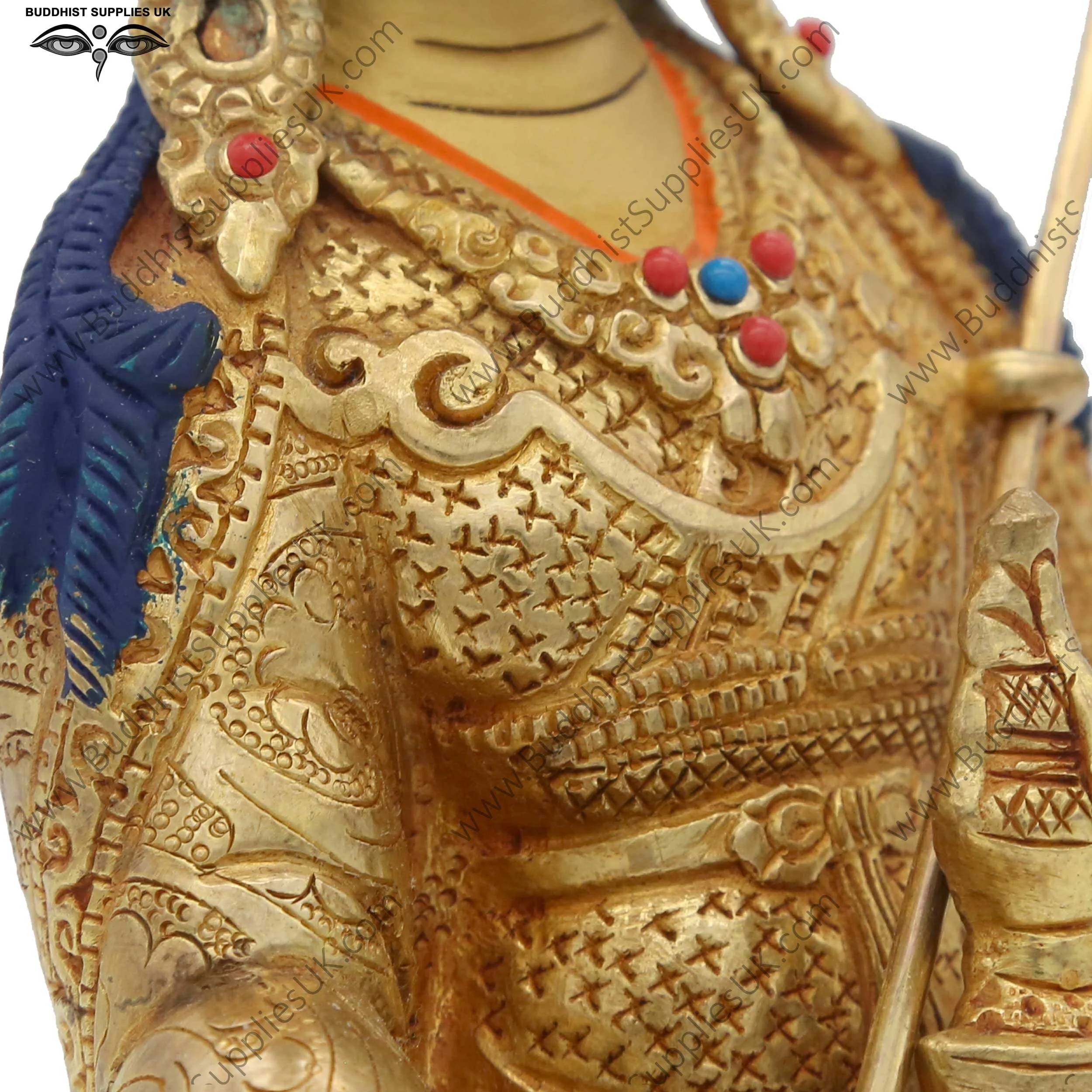 Gold plated Guru Rinpoche statue carving detail