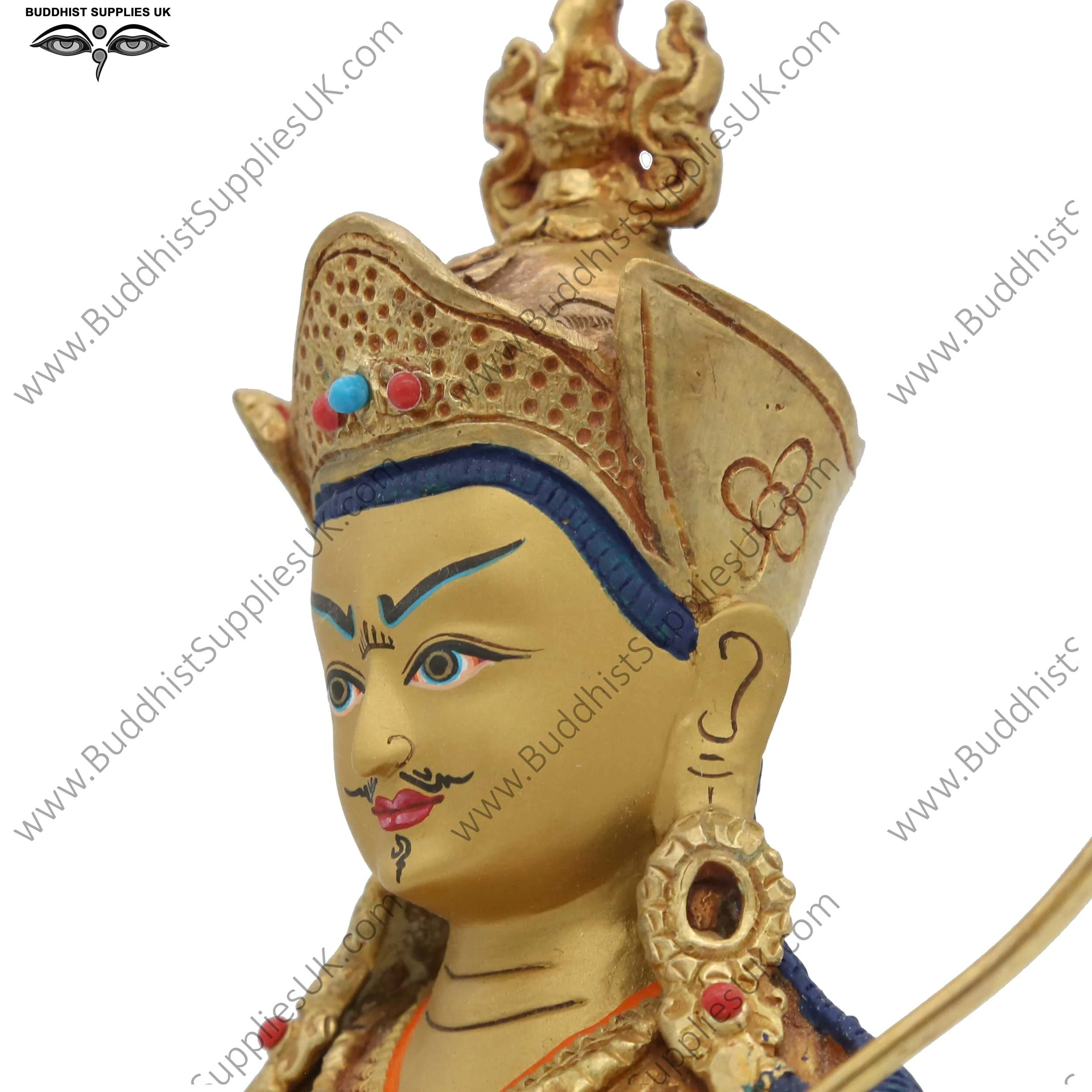 Gold plated Guru Rinpoche statue face