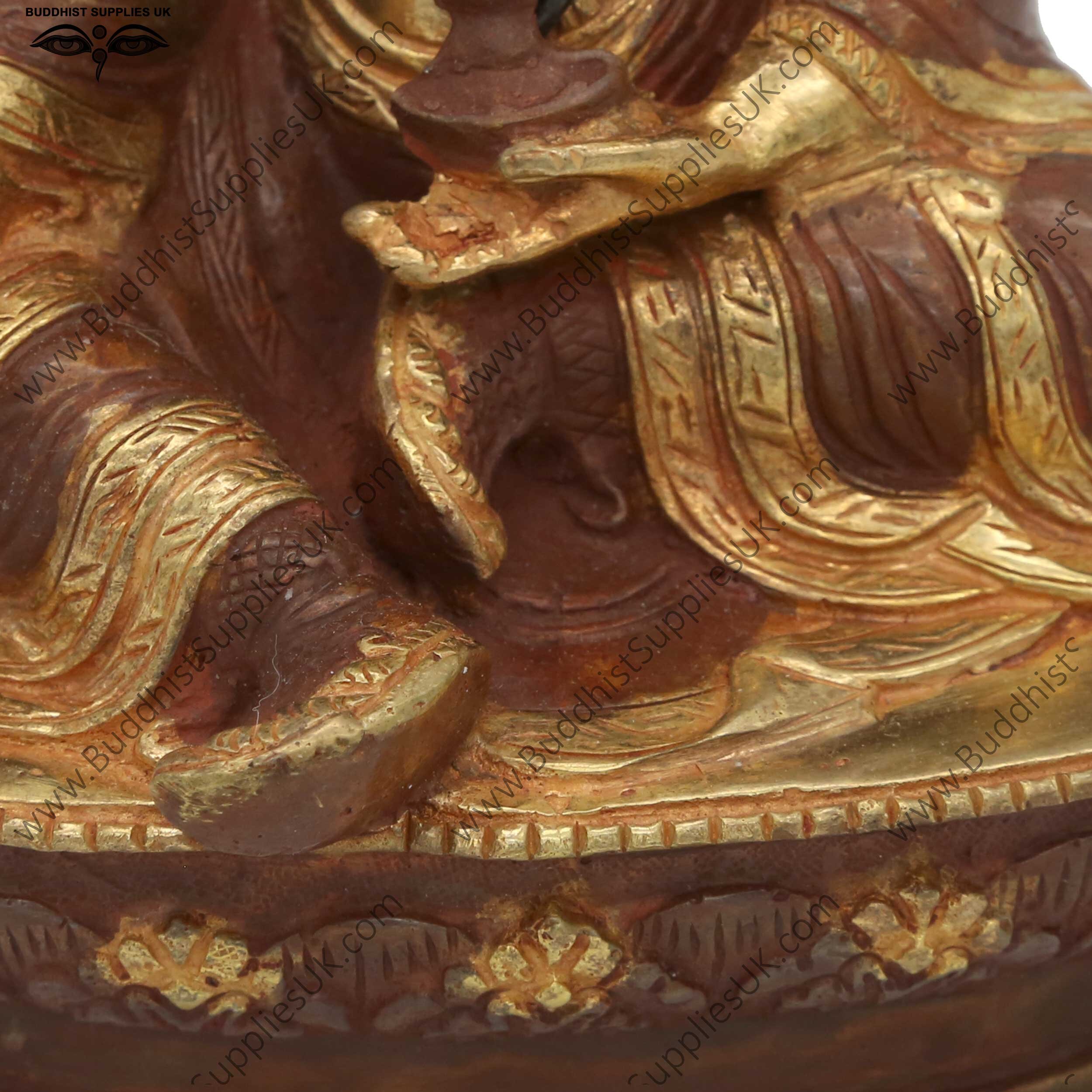 Part gold plate Guru Rinpoche statue detail