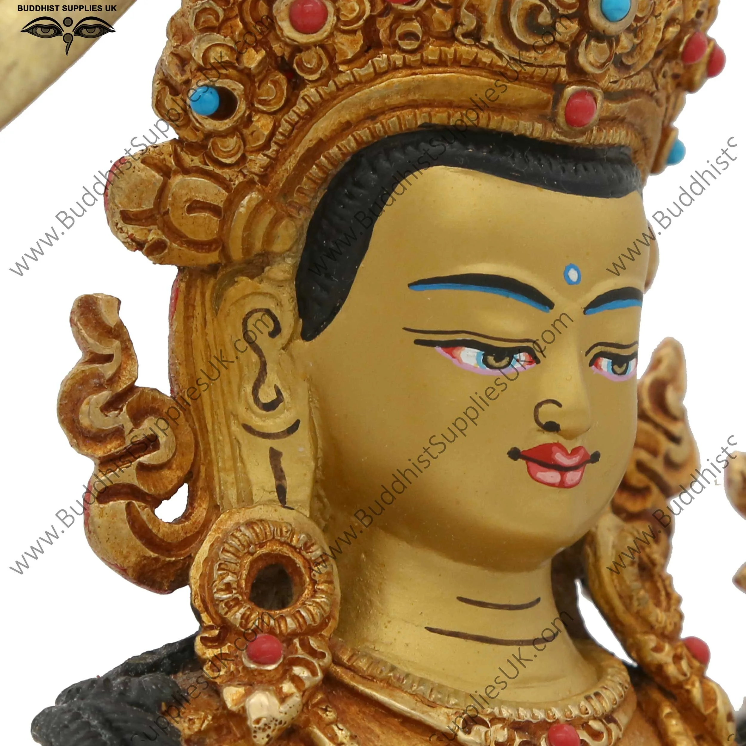 Gold plated Manjushri statue face