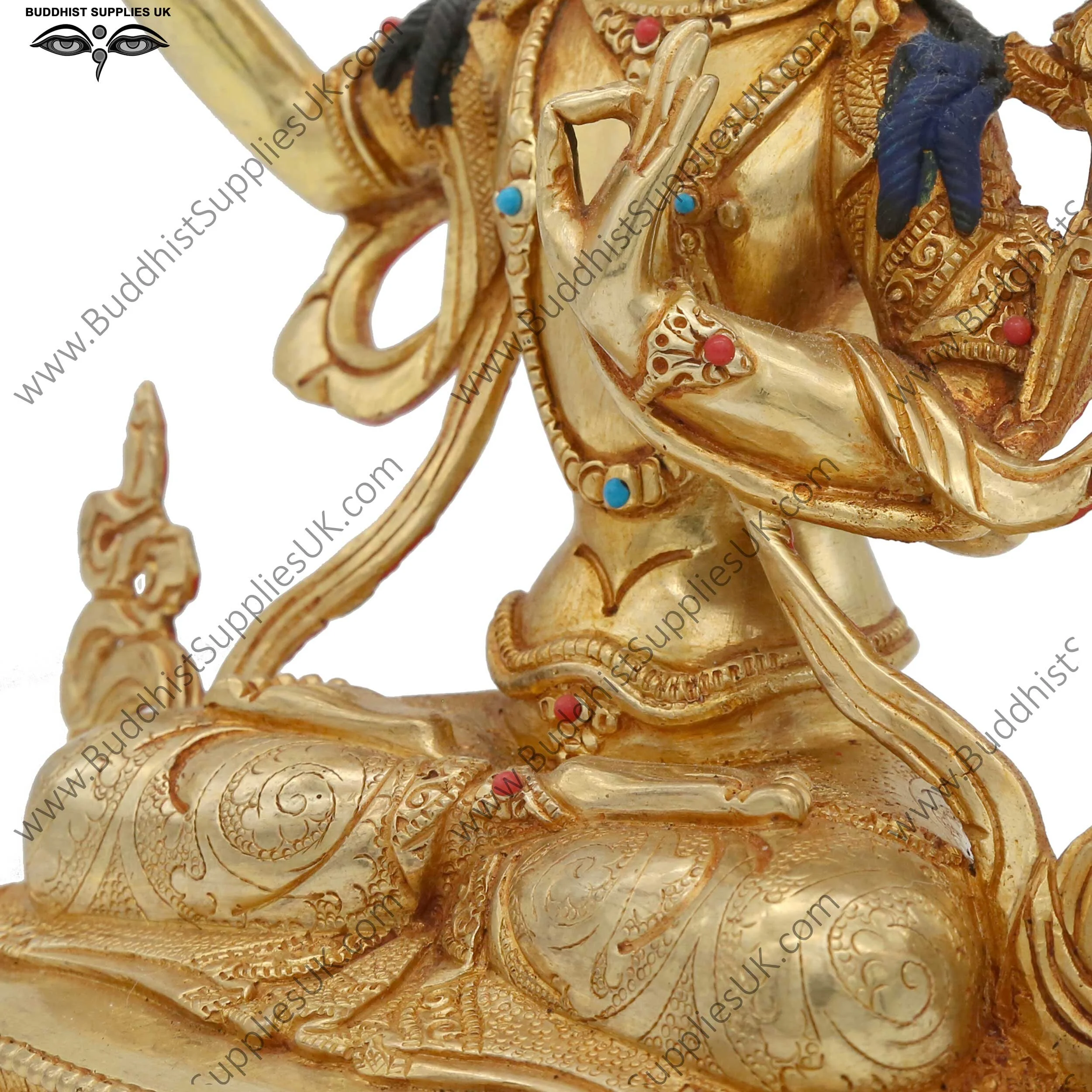 Gold plated Manjushri statue detail