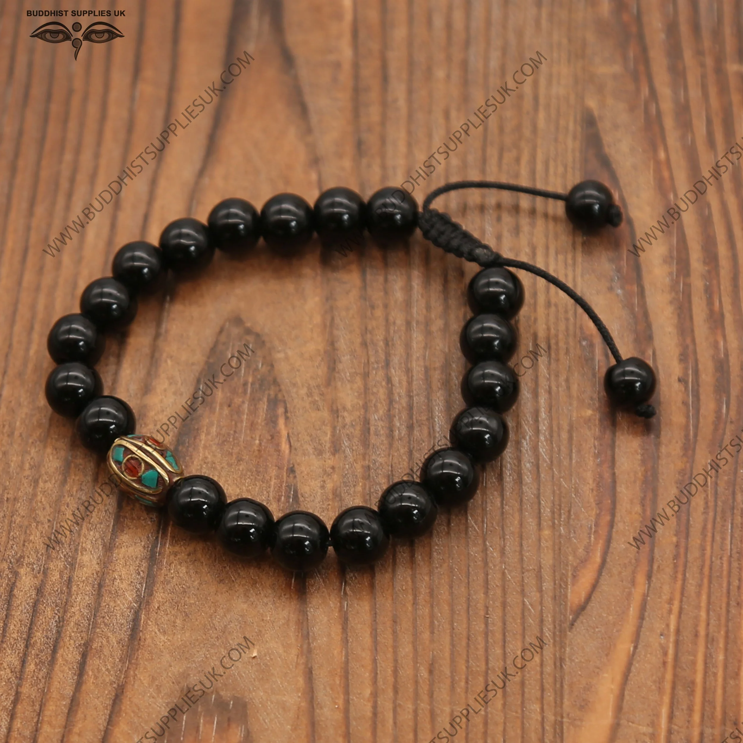 Polished-Black-Onyx-wrist-Mala,-ornate-bead,-adjustable-WM71PBO-1.jpg