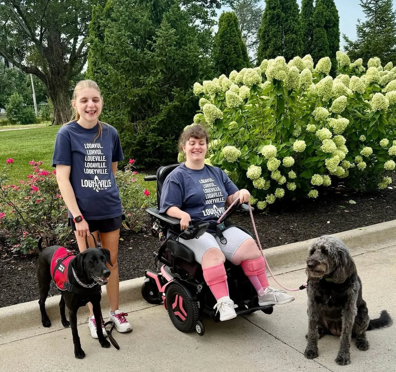 Two (and) four-legged friends came home from their latest road trip with some pretty great souvenirs! 🐾👕 
Looks like the memories (and the matching shirts) are going to last long after the miles are behind them. ❤️
.
.
.
#midamericaservicedogs #cha