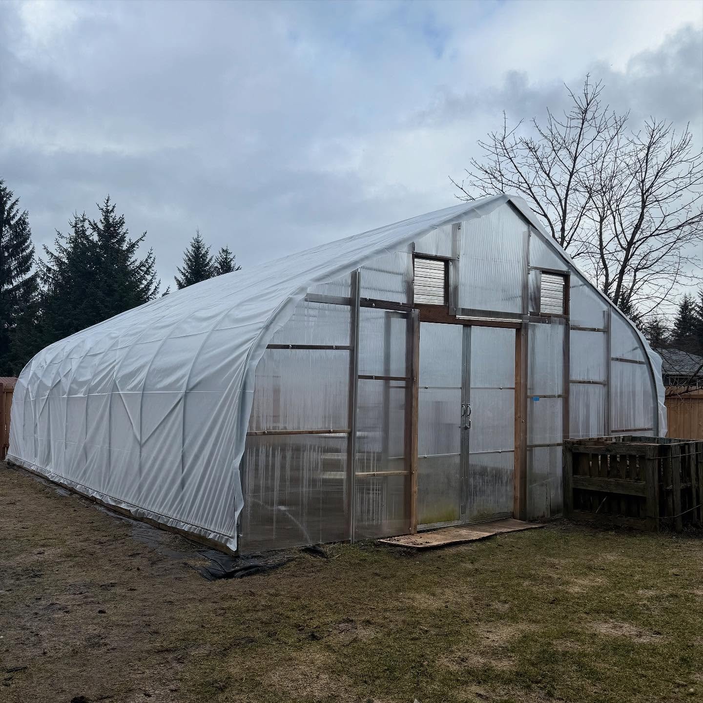 We got the top on the high tunnel today! I was going to wait a few weeks but the weather was decent so decided to just do it. 🥰