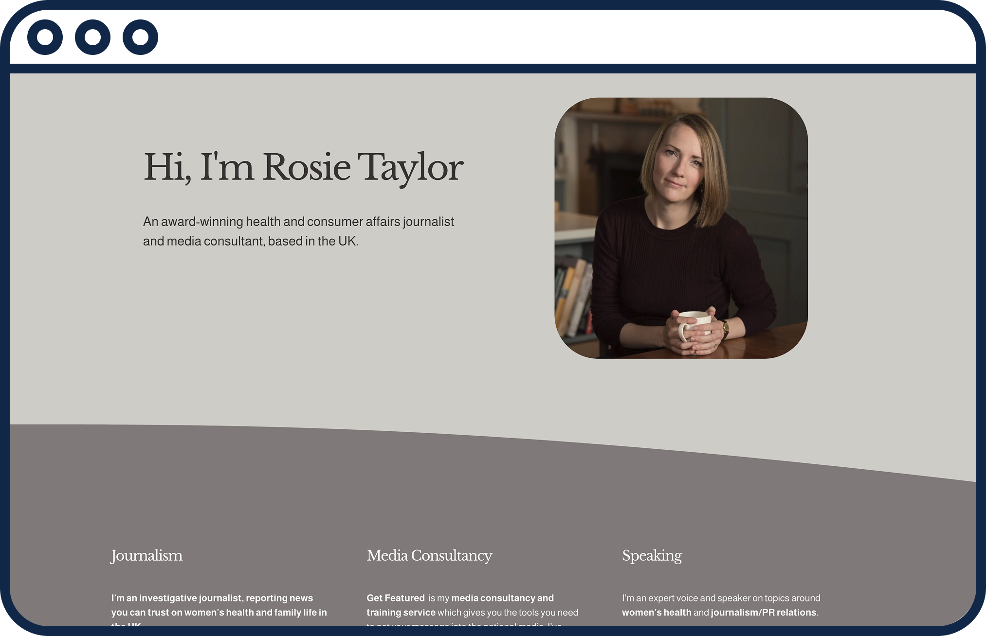 Rosie Taylor sitting at a table with a mug, wearing a black top, in a cozy indoor setting with bookshelves in the background.