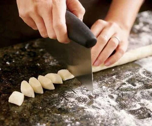 gnocchi being cut.jpg