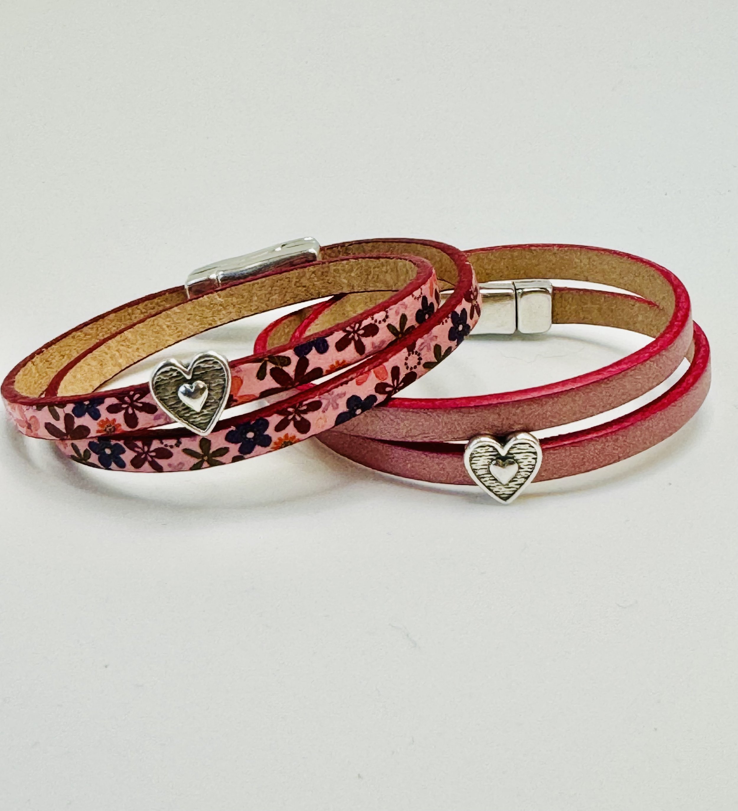 2 pink leather double wrap bracelets with heart charms