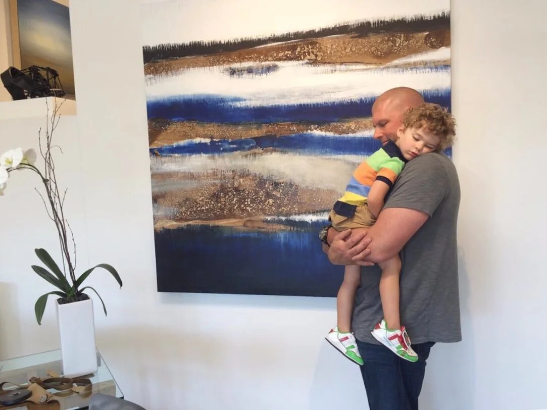 Michael Irvin with their firstborn son, Azure.