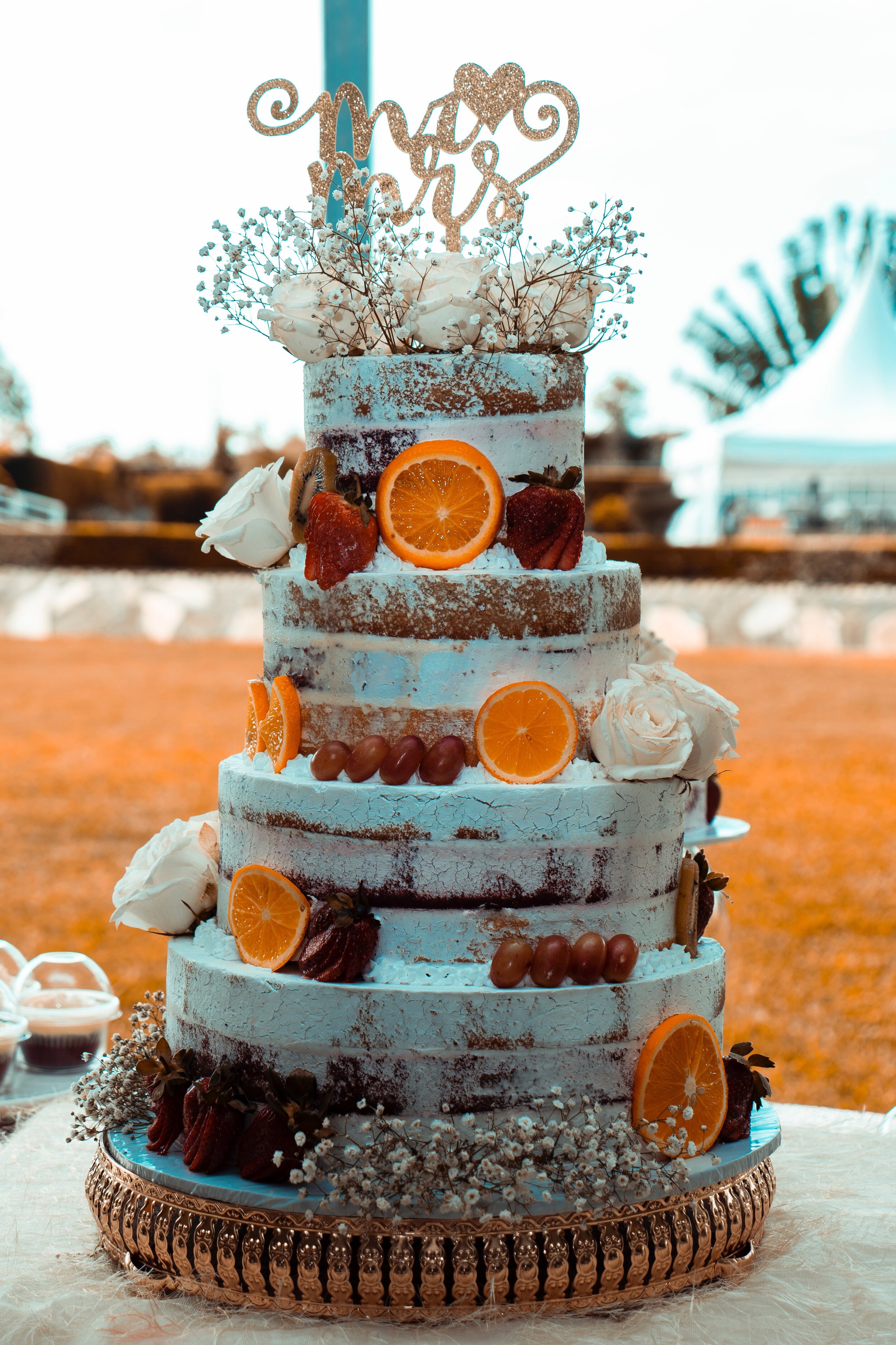 4-tier-cake-with-sliced-oranges-on-surface-2510104.jpg