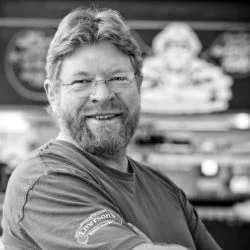 Richard Emerson   Years ago, a young Richard Emerson sent a postcard back from his OE telling how he would set up a brewpub in Dunedin one day, inspired by those he found whilst travelling. His passion for craft beer is only matched by his passion for food, and for the joy of finding a perfect pairing of beer and food! Richard’s dream was kept alive during all his years’ brewing, and his partnership with Lion in 2012 helped to speed up bringing this dream to fruition. On the 4th of July 2016, Emerson’s Brewery &amp; Taproom opened at 70 Anzac Ave, a stone’s throw from Dunedin’s Forsyth Barr Stadium.