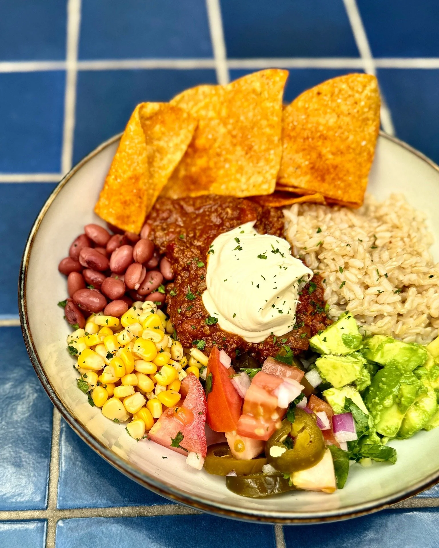 Our new spring Express Lunch menu is here and it's packed with delicious delights!

Say hey to the Burrito Bowl: brown rice, avocado, beans, corn, pico de gallo, sour cream and corn chips, topped with your choice of chilli con carne, harissa chicken 