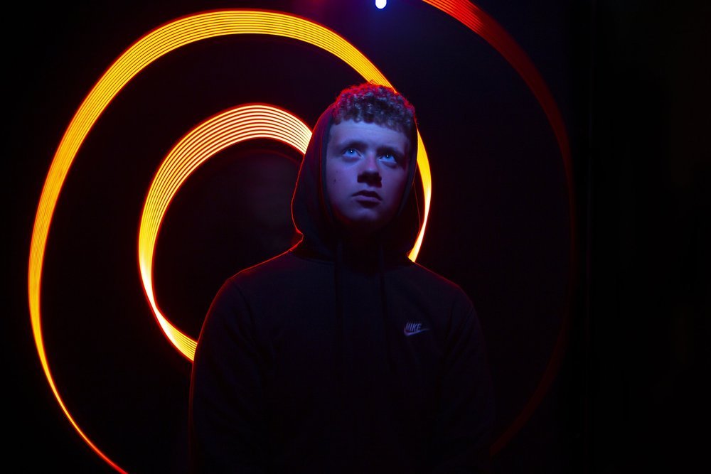 Teenager portrait with neon lighting