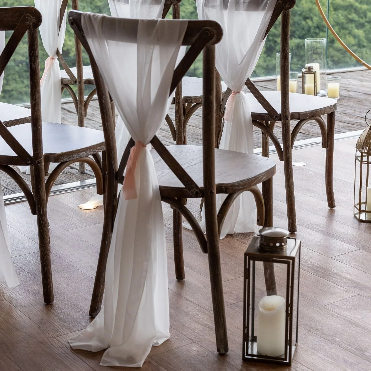 ivory chair drape at a Devon wedding ceremony