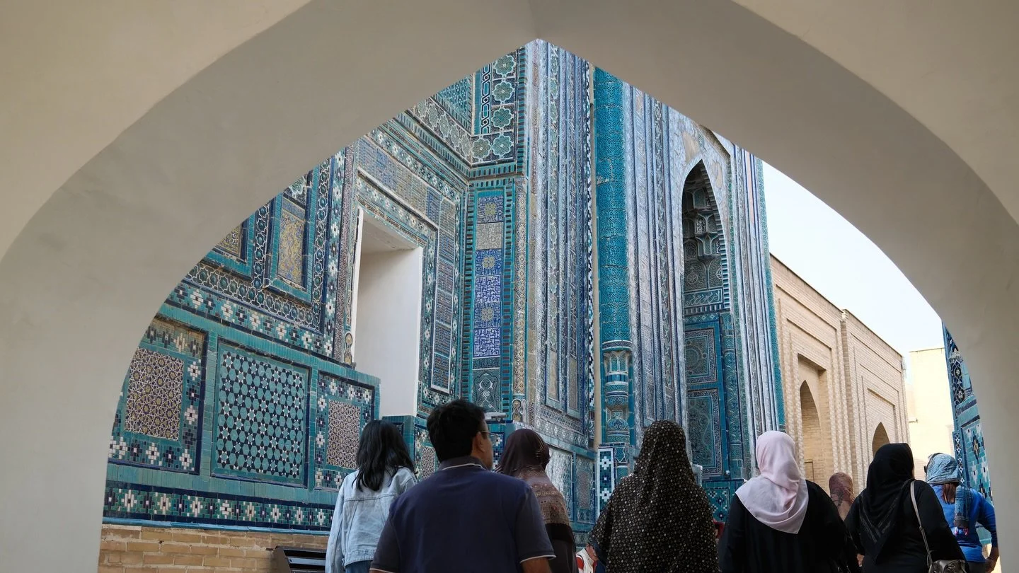 Samarkand, Uzbekistan stays with you.
In light filtered through ancient screens.
In turquoise and golds that shimmer and shine.
In geometric patterns meant to be read slowly.
In moments that ask you to pause.

It is a gorgeous city that does not fade
