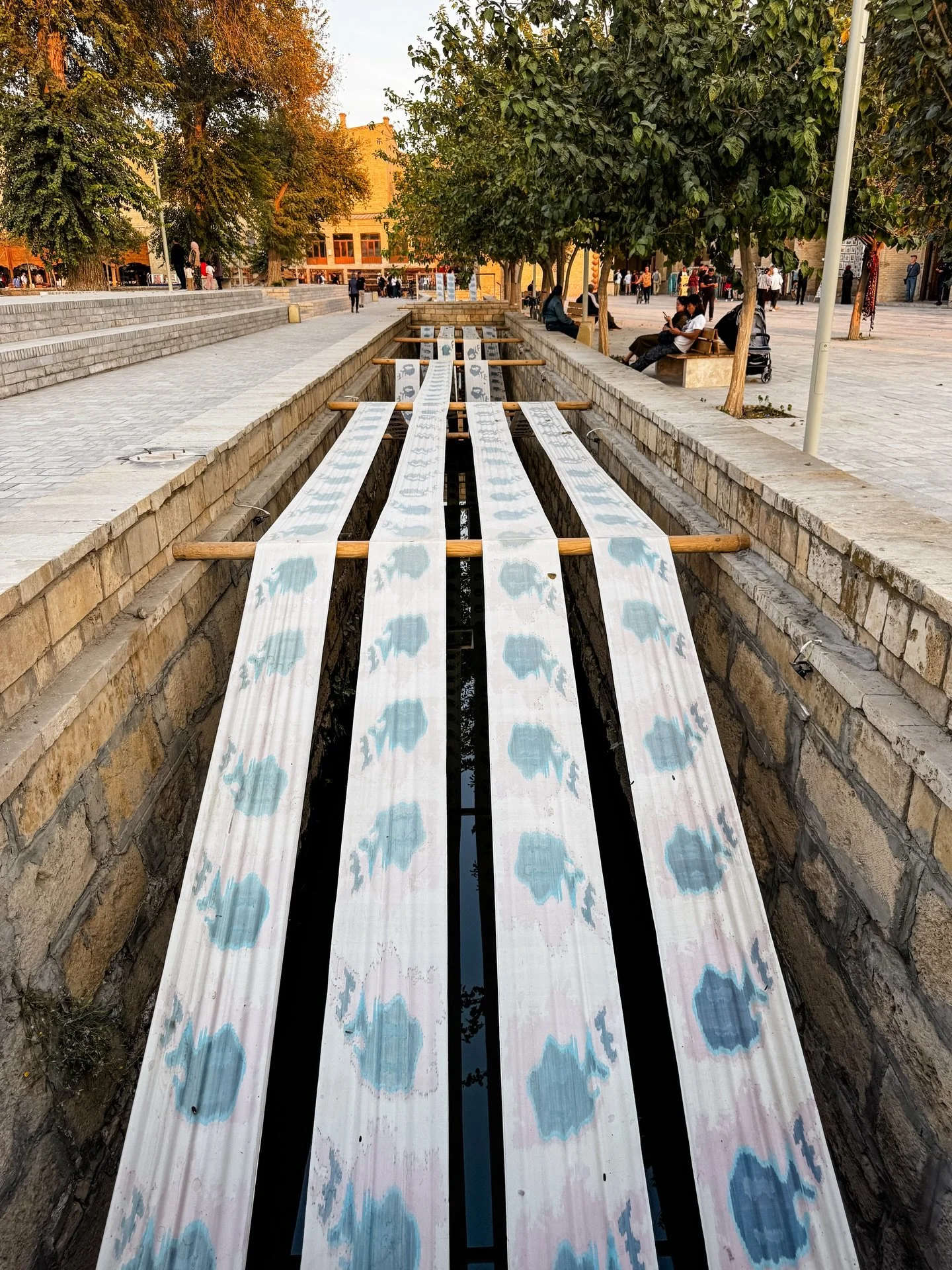 Found this beautiful ikat fabric weaving and threading along the canals of Bukhara. It really connected the city in wonderfully traditional way! 

💙 Longing, 2024&ndash;2025
✨ By Himali Singh Soin @himalisinghsoin + David Soin Tappeser @davidsointap