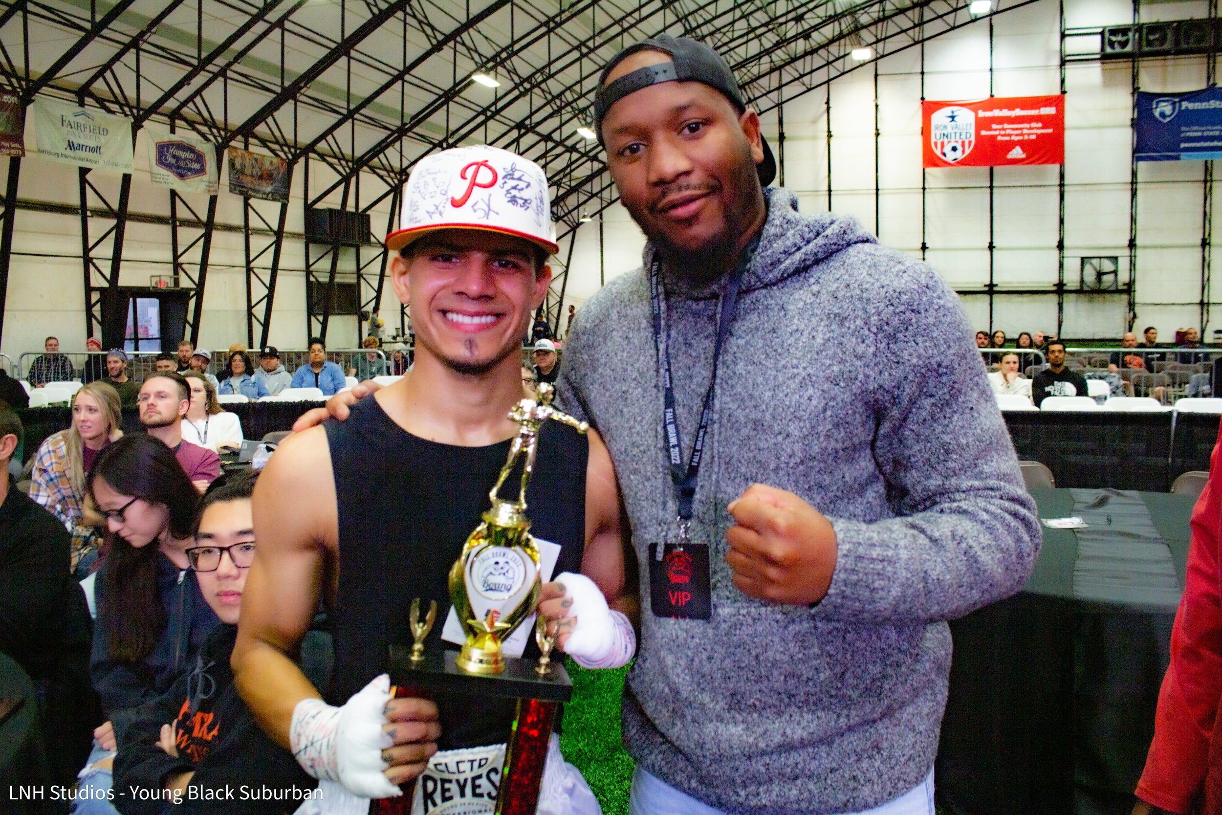 Tim Witherspoon Jr. Joins a boxer after he wins his match