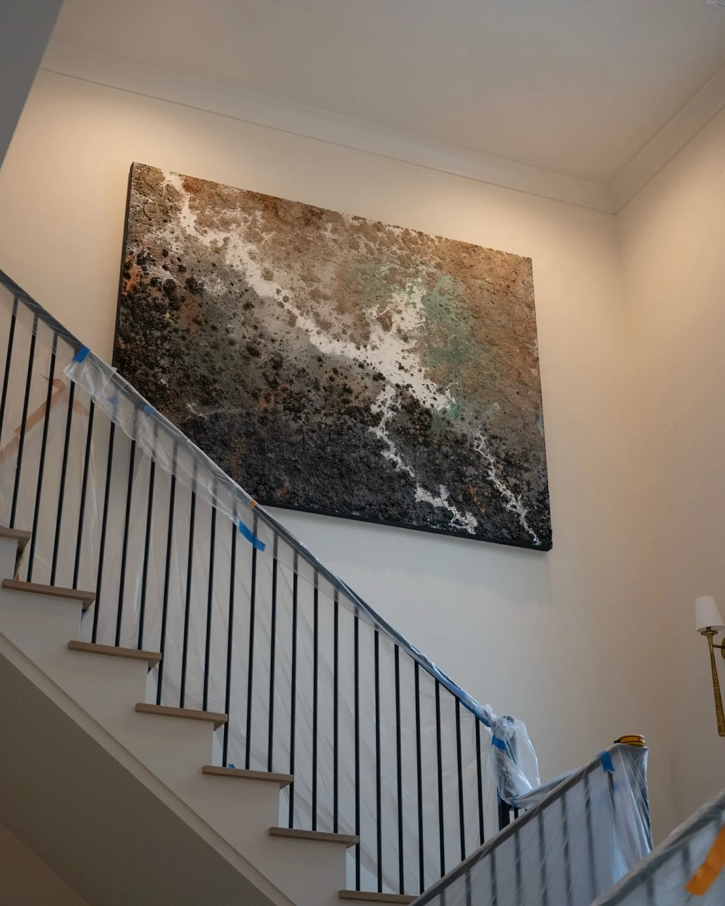 Its almost as if this this staircase was built for this 6 x 8ft &lsquo;Interstellar&rsquo; painting. #abstract #texture #landscapepainting #interiordesign